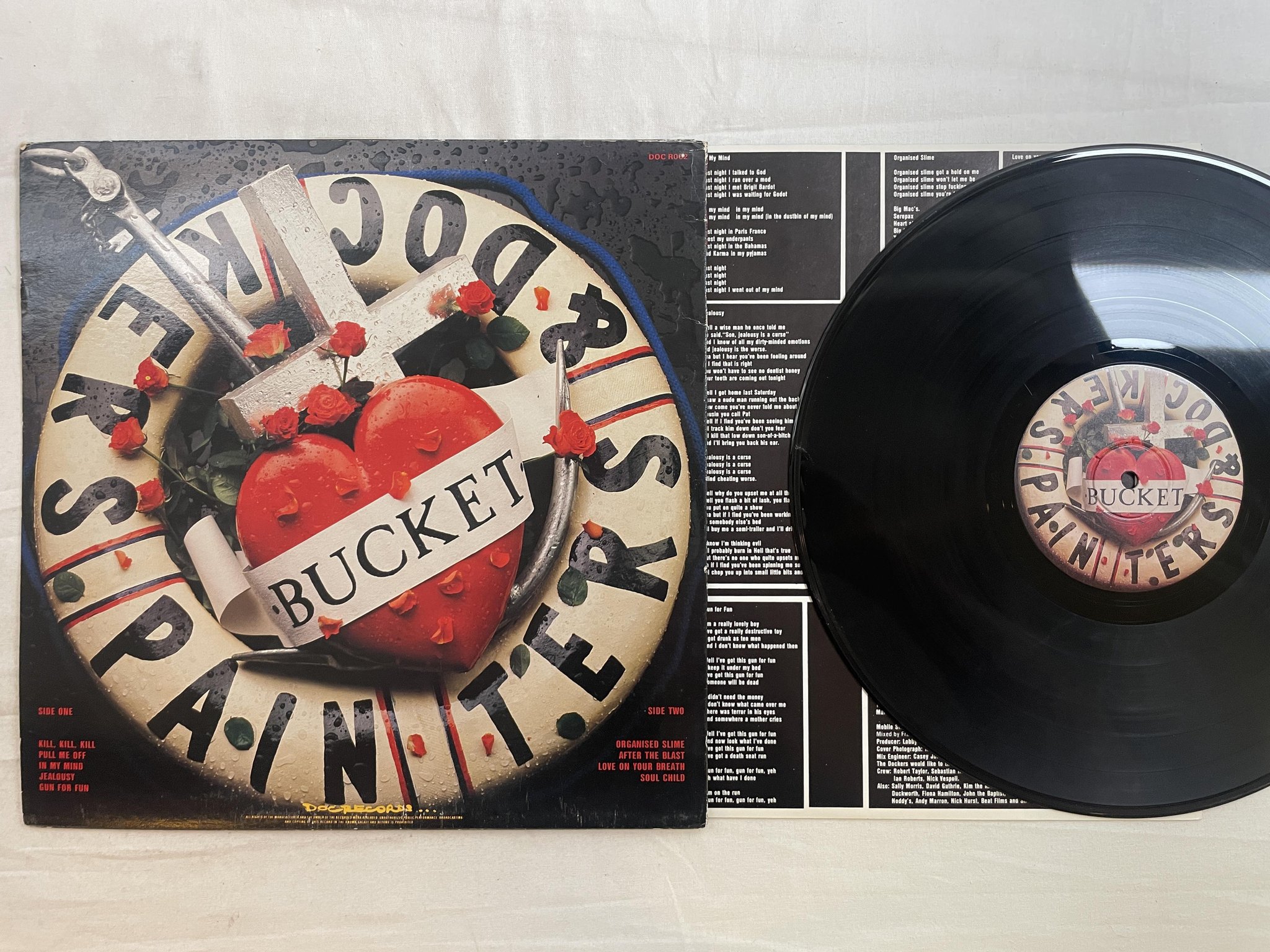 Omslagsbild för skivan PAINTERS & DOCKERS Bucket LP -86 Australia DOC R002