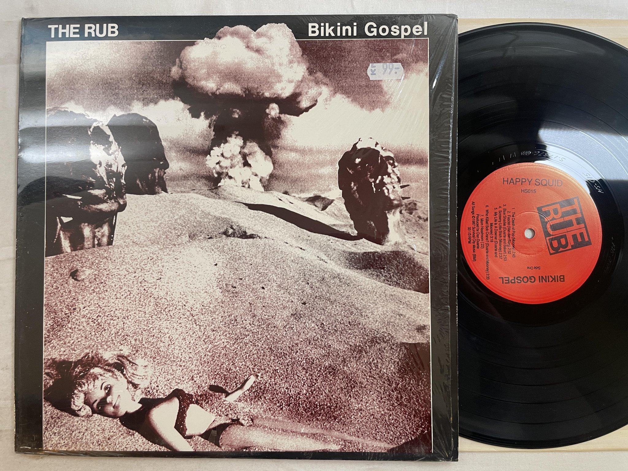 Omslagsbild för skivan THE RUB bikini gospel LP -87 US HAPPY SQUID HS 015