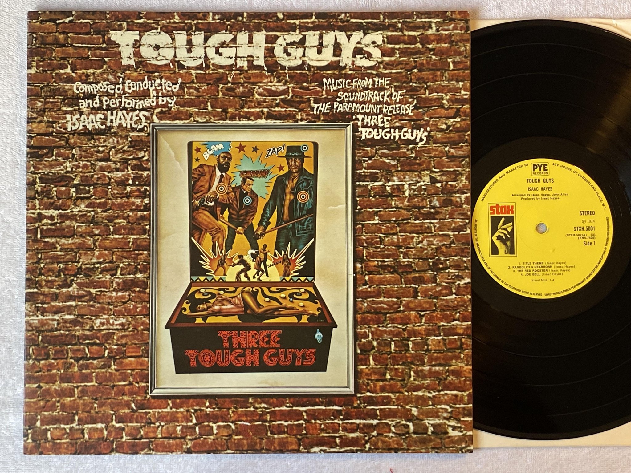 Omslagsbild för skivan ISAAC HAYES tough guys LP -74 UK STX STXH 5001
