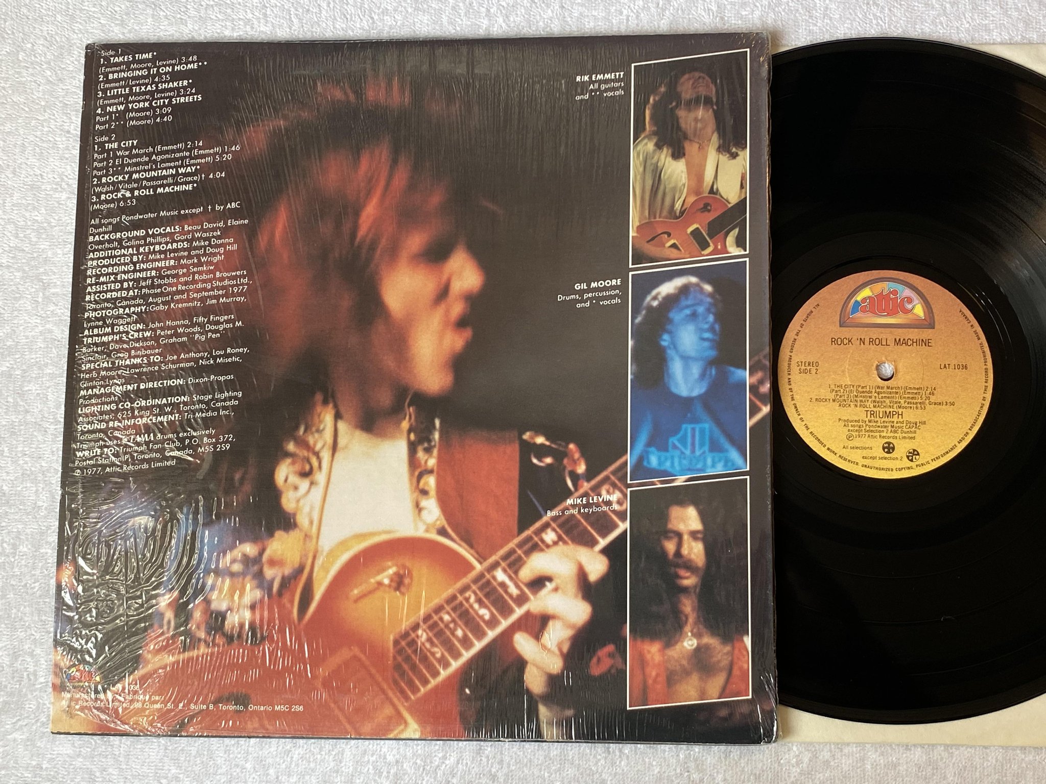 Omslagsbild för skivan TRIUMPH rock n roll machine LP -77 Can ATTIC LAT 1036