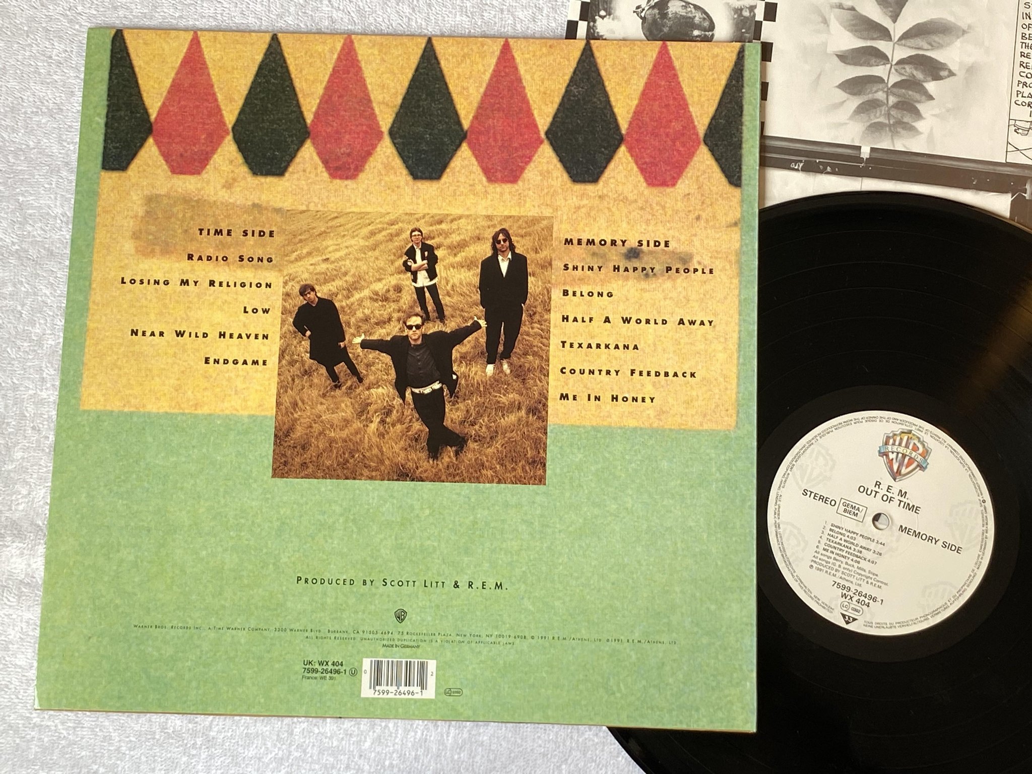 Omslagsbild för skivan R.E.M. out of time LP -91 Ger WARNER BROS 7599 26496-1
