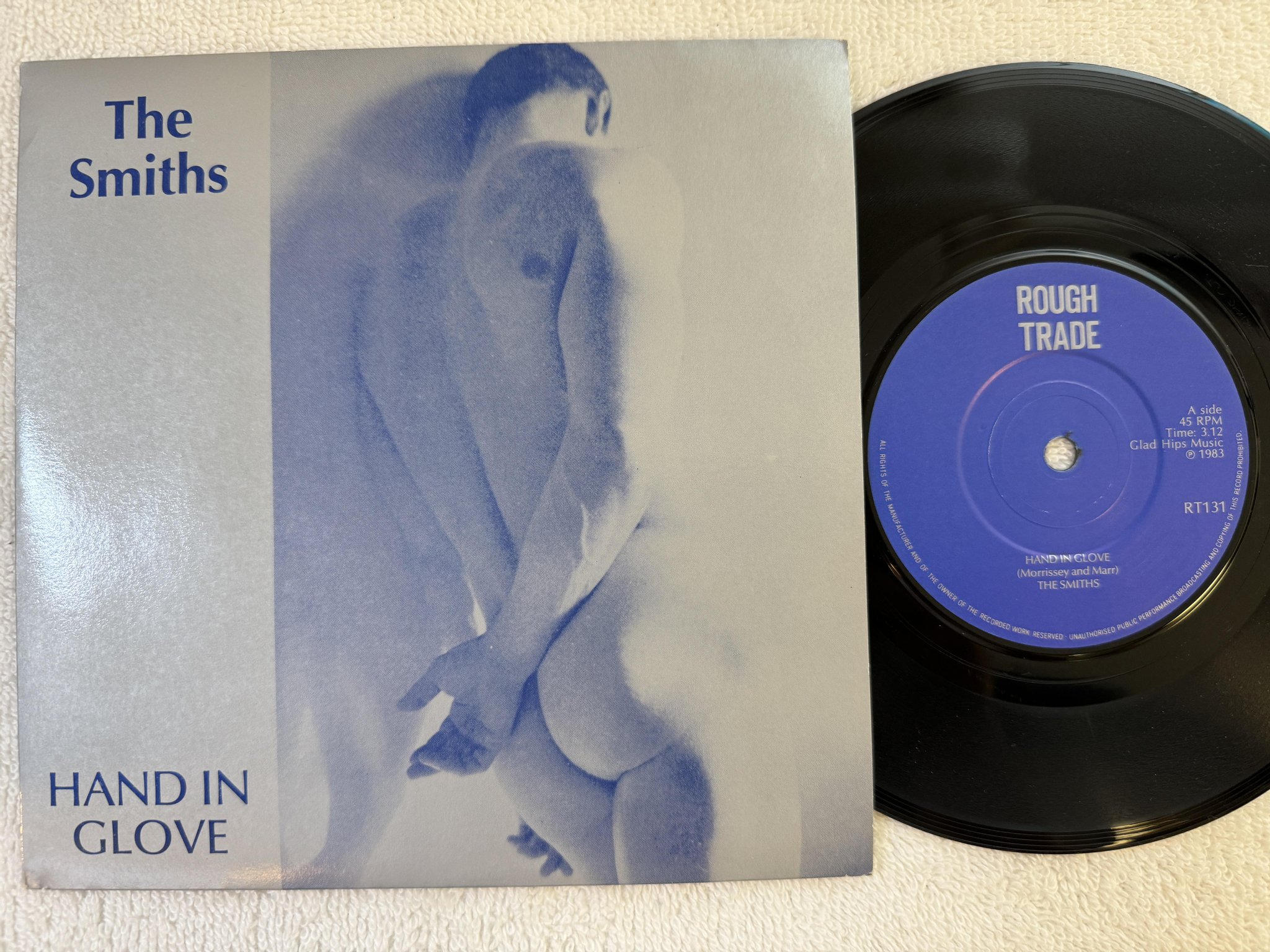 Omslagsbild för skivan THE SMITHS hand in glove 7" -83 UK ROUGH TRADE RT 131 ** Manchester Address **