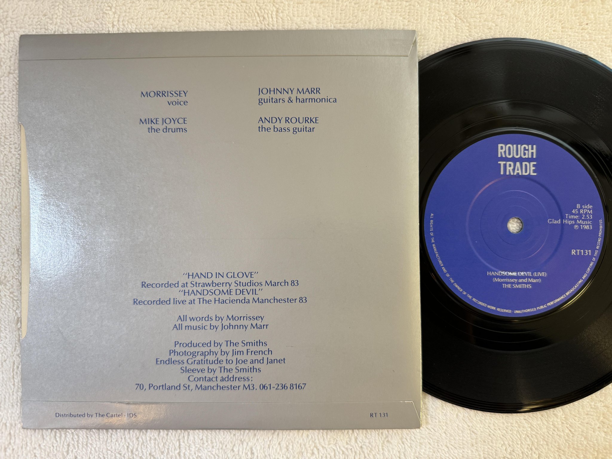 Omslagsbild för skivan THE SMITHS hand in glove 7" -83 UK ROUGH TRADE RT 131 ** Manchester Address **