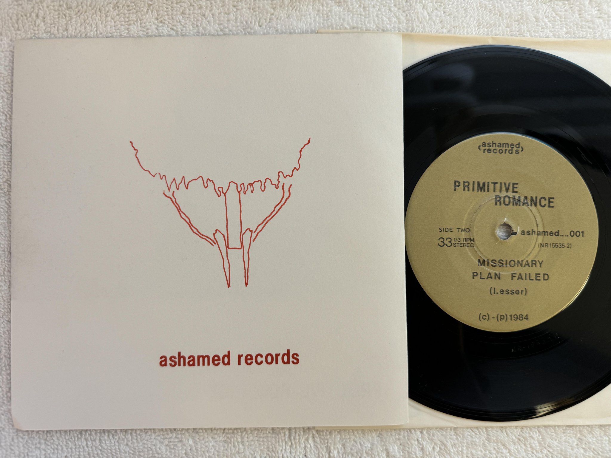 Omslagsbild för skivan PRIMITIVE ROMANCE The Spirit's Still There 7" -84 US ashamed 001