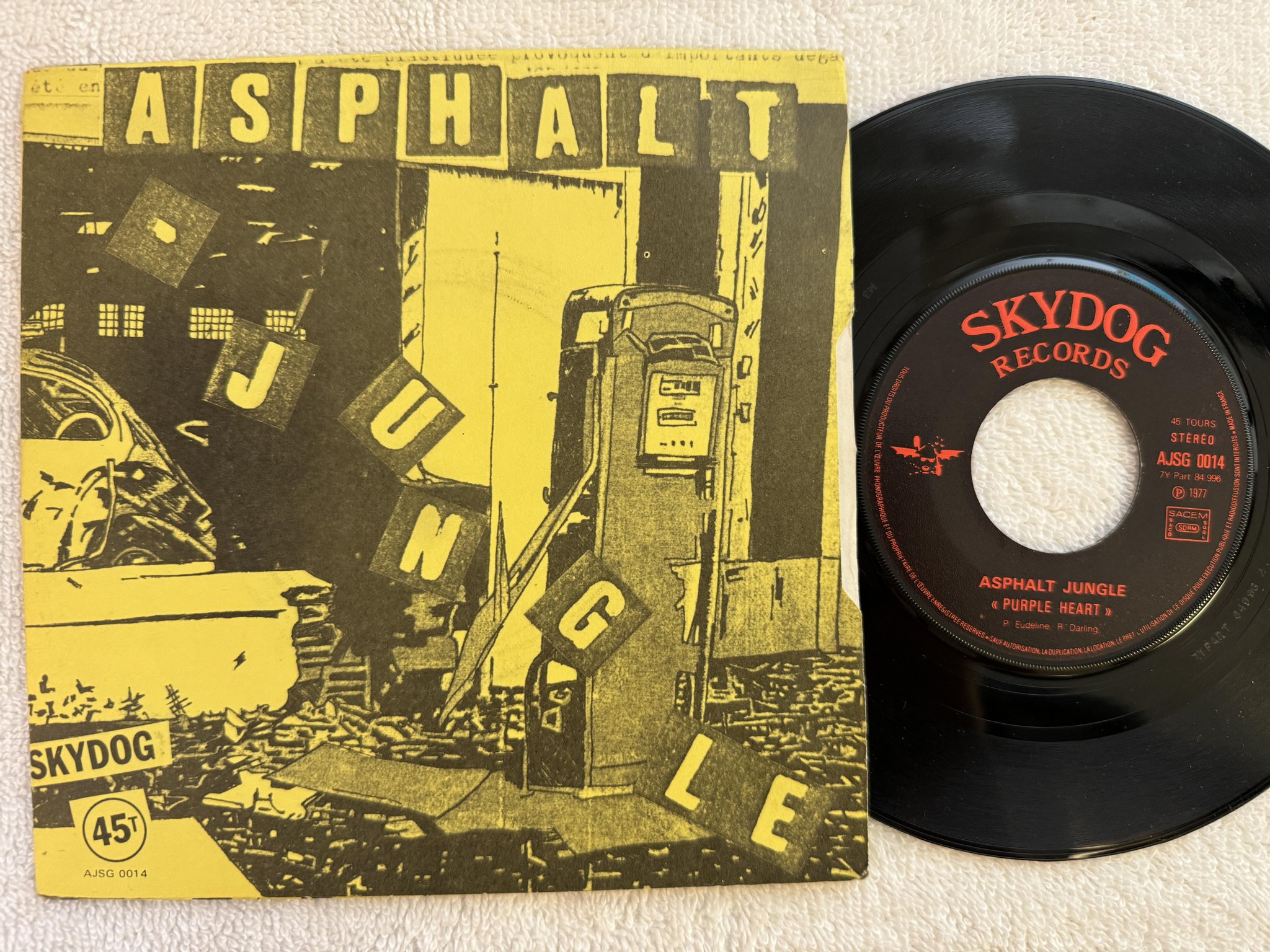 Omslagsbild för skivan ASPHALT JUNGLE Planté Comme Un Privé 7" -78 fra SKYDOG AJSG 0014