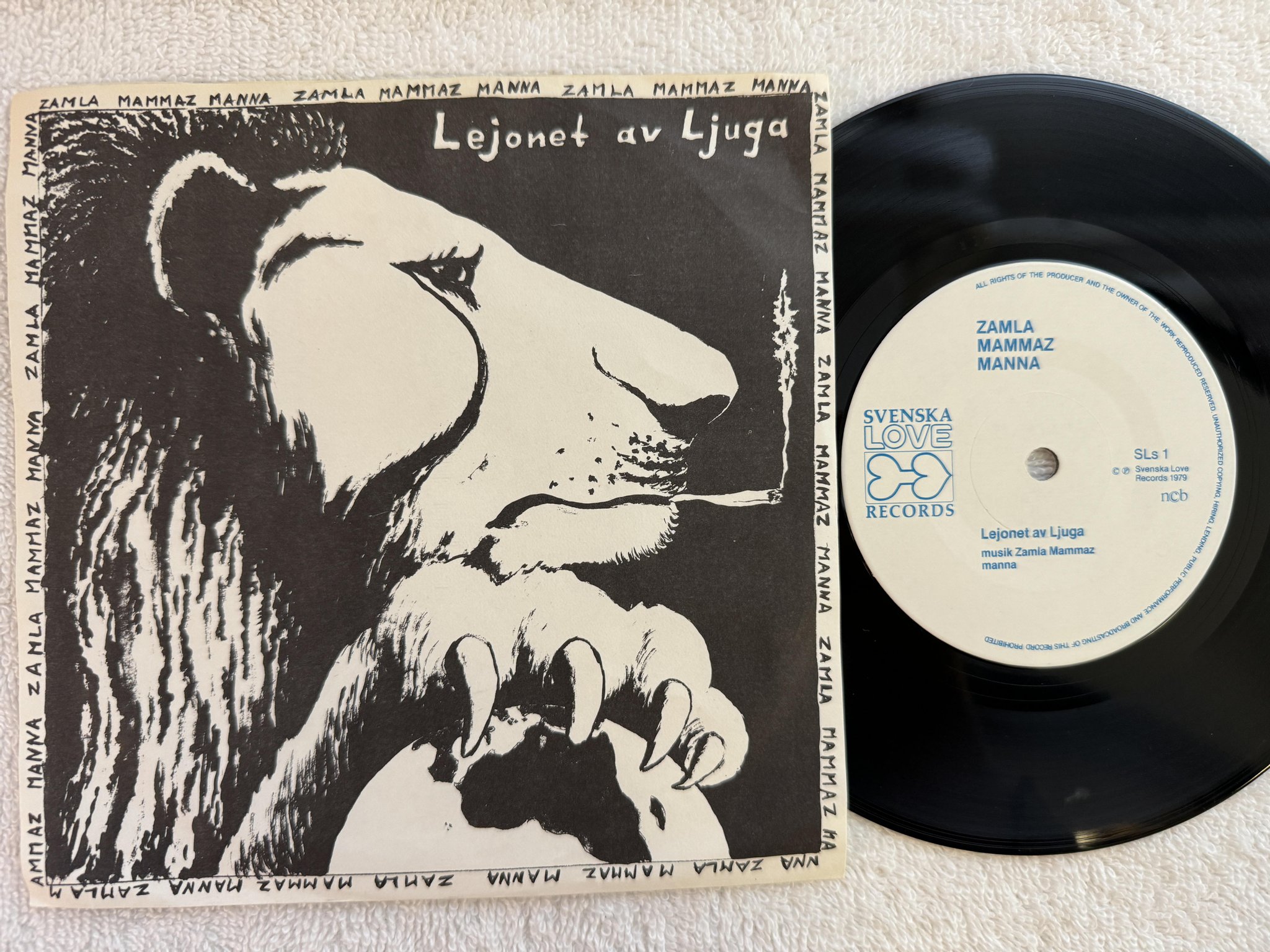 Omslagsbild för skivan ZAMLA MAMMAZ MANNA lejonet av Ljuga 7" -79 SVENSKA LOVE SLs-1