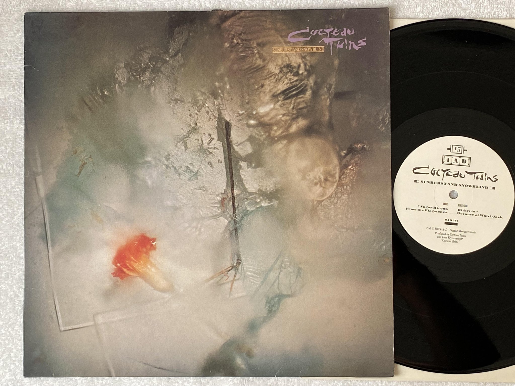 Omslagsbild för skivan COCTEAU TWINS Sunburst And Snowblind 12"EP -83 4AD BAD 314