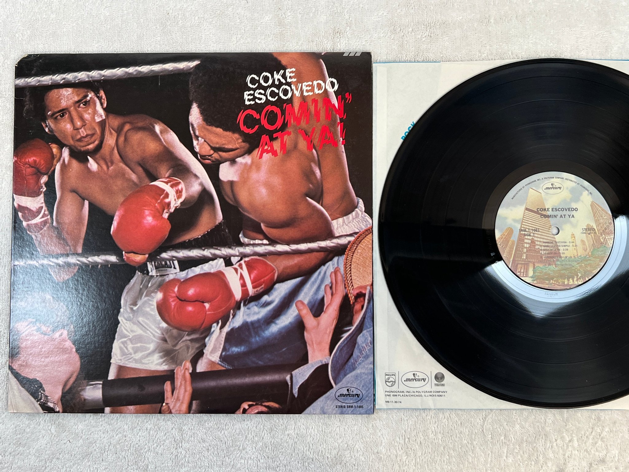 Omslagsbild för skivan COKE ESCOVEDO comin' at ya LP -76 SRM 1-1085 *** I WOULDN'T CHANGE A THING ***