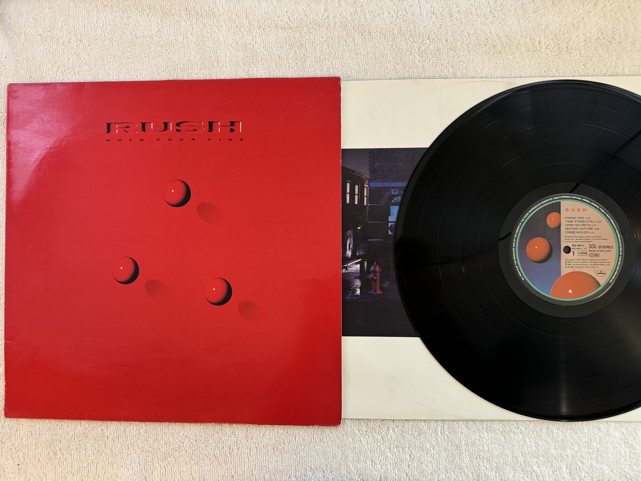 Omslagsbild för skivan RUSH hold your fire LP -87 Hol MERCURY 832 464-1