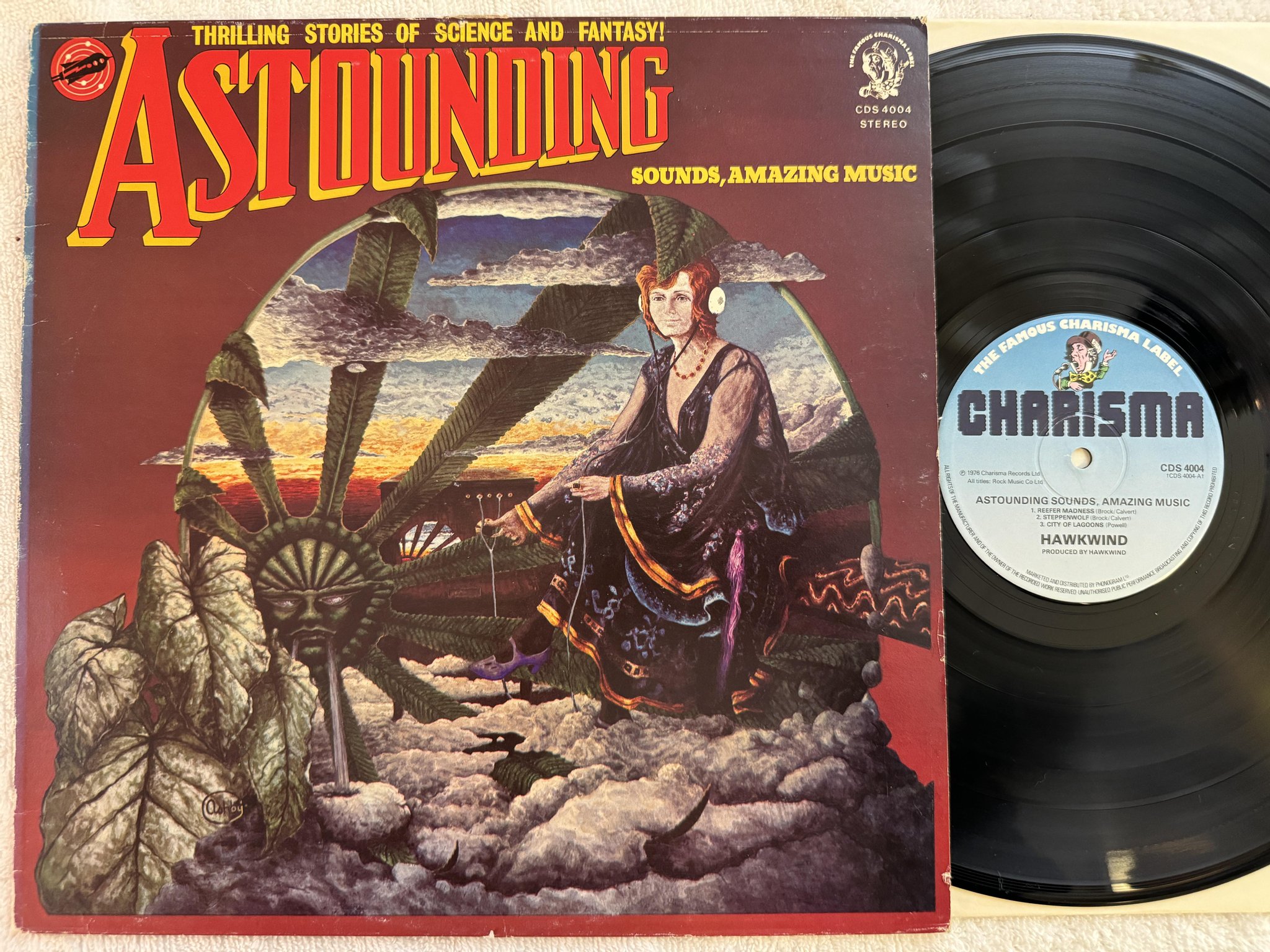 Omslagsbild för skivan HAWKWIND astounding sounds, amazing music LP -76 UK CHARISMA CDS 4004