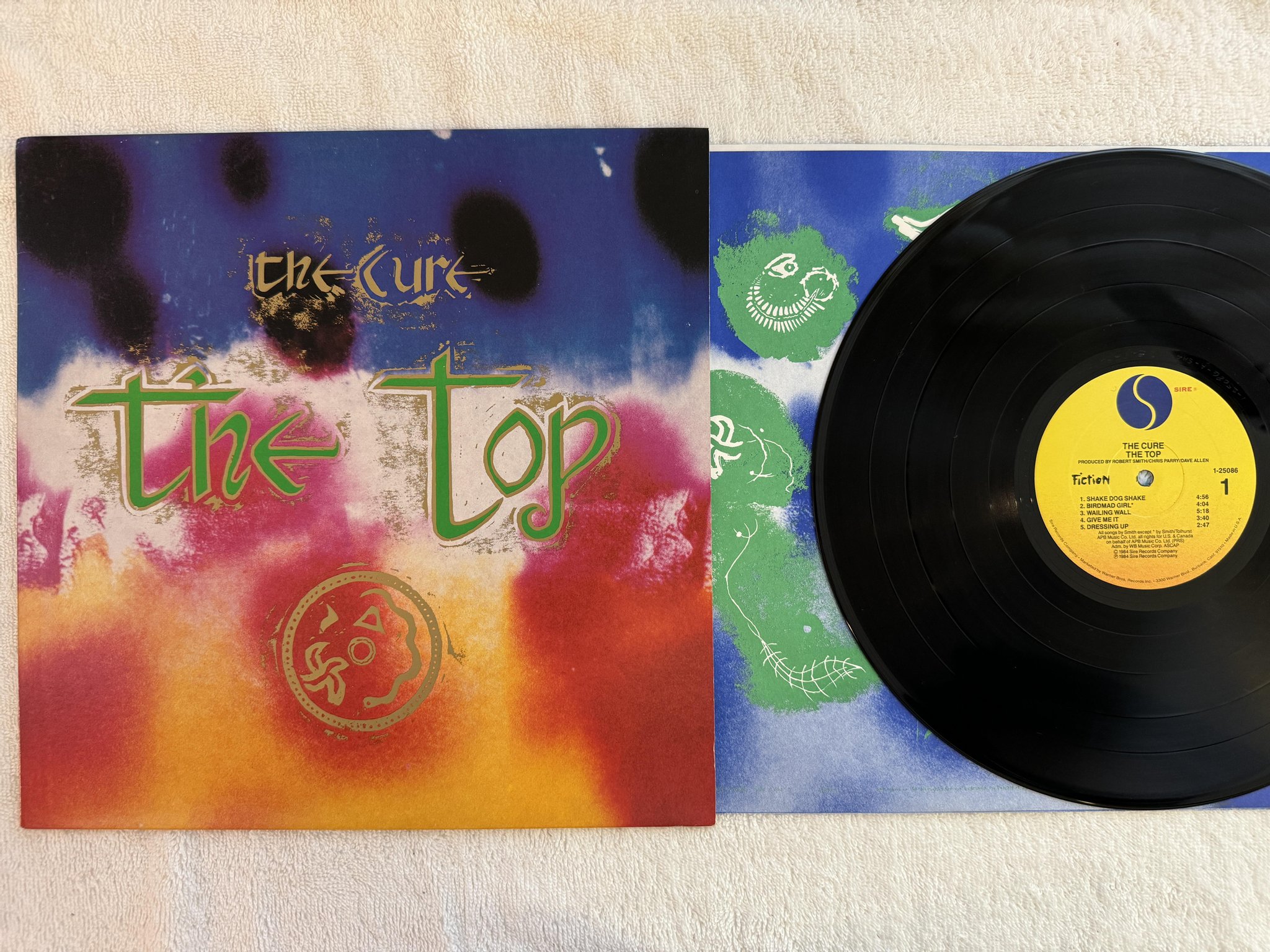 Omslagsbild för skivan THE CURE the top LP -84 US SIRE 1-25086