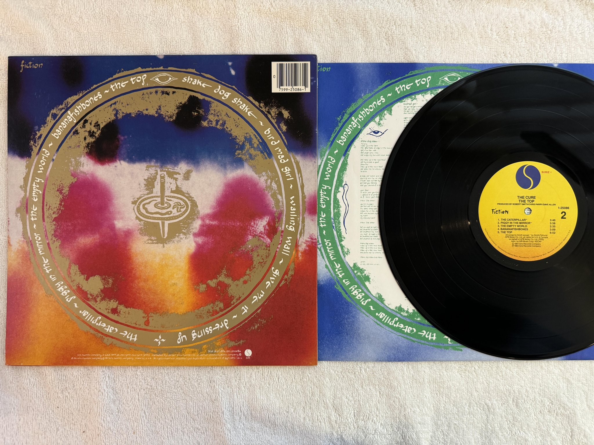 Omslagsbild för skivan THE CURE the top LP -84 US SIRE 1-25086