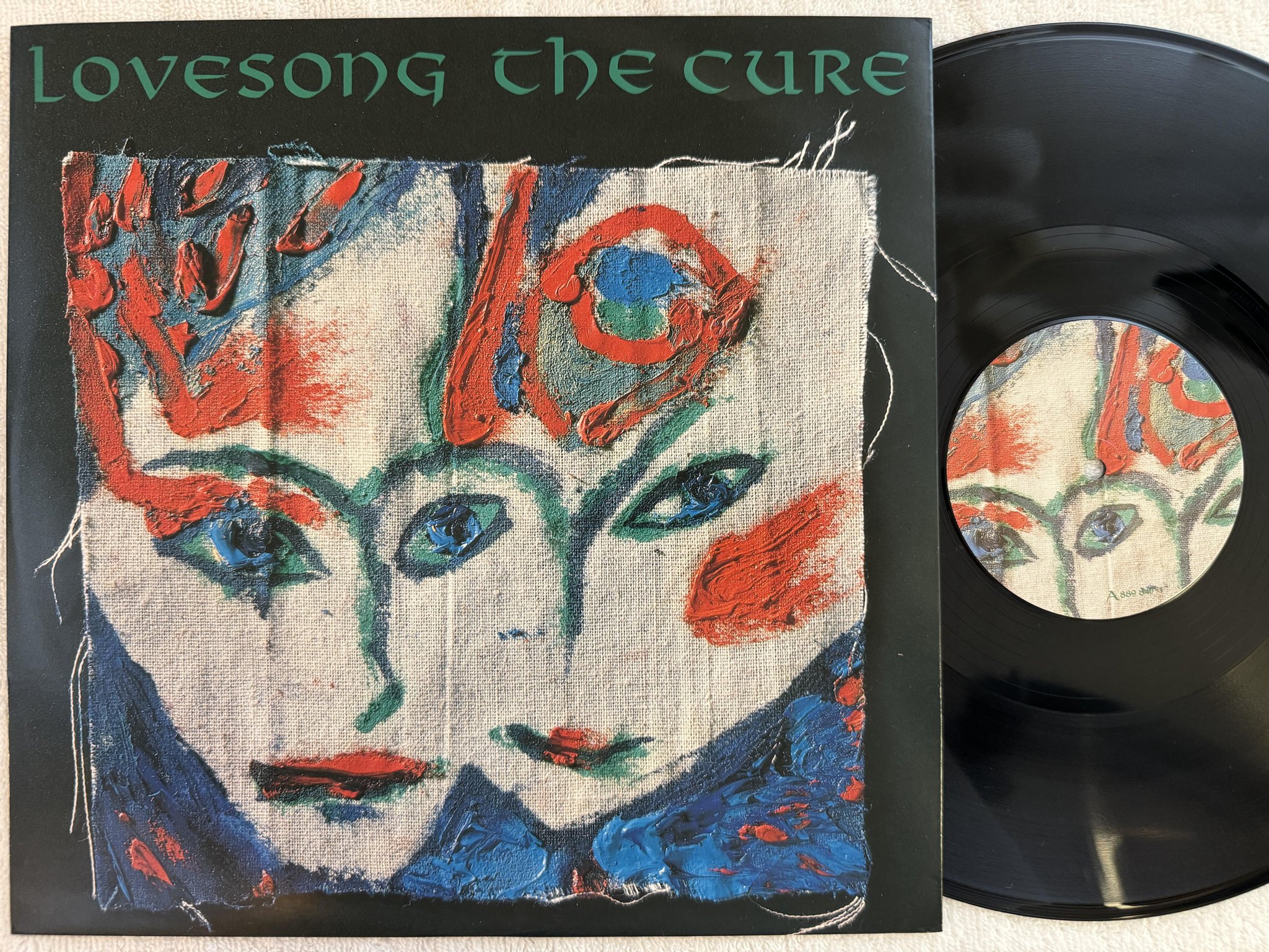Omslagsbild för skivan THE CURE Lovesong 12"single -89 UK FICTION FICSX 30