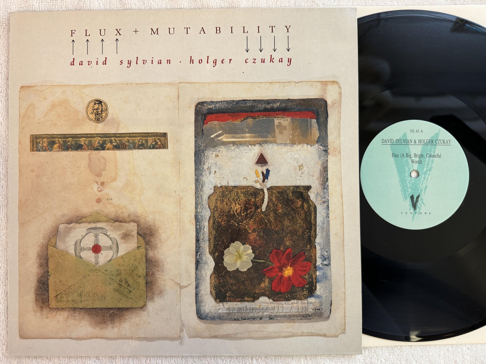 Omslagsbild för skivan DAVID SYLVIAN - HOLGER CZUKAY flux + mutability LP -89 VENTURE VE 43