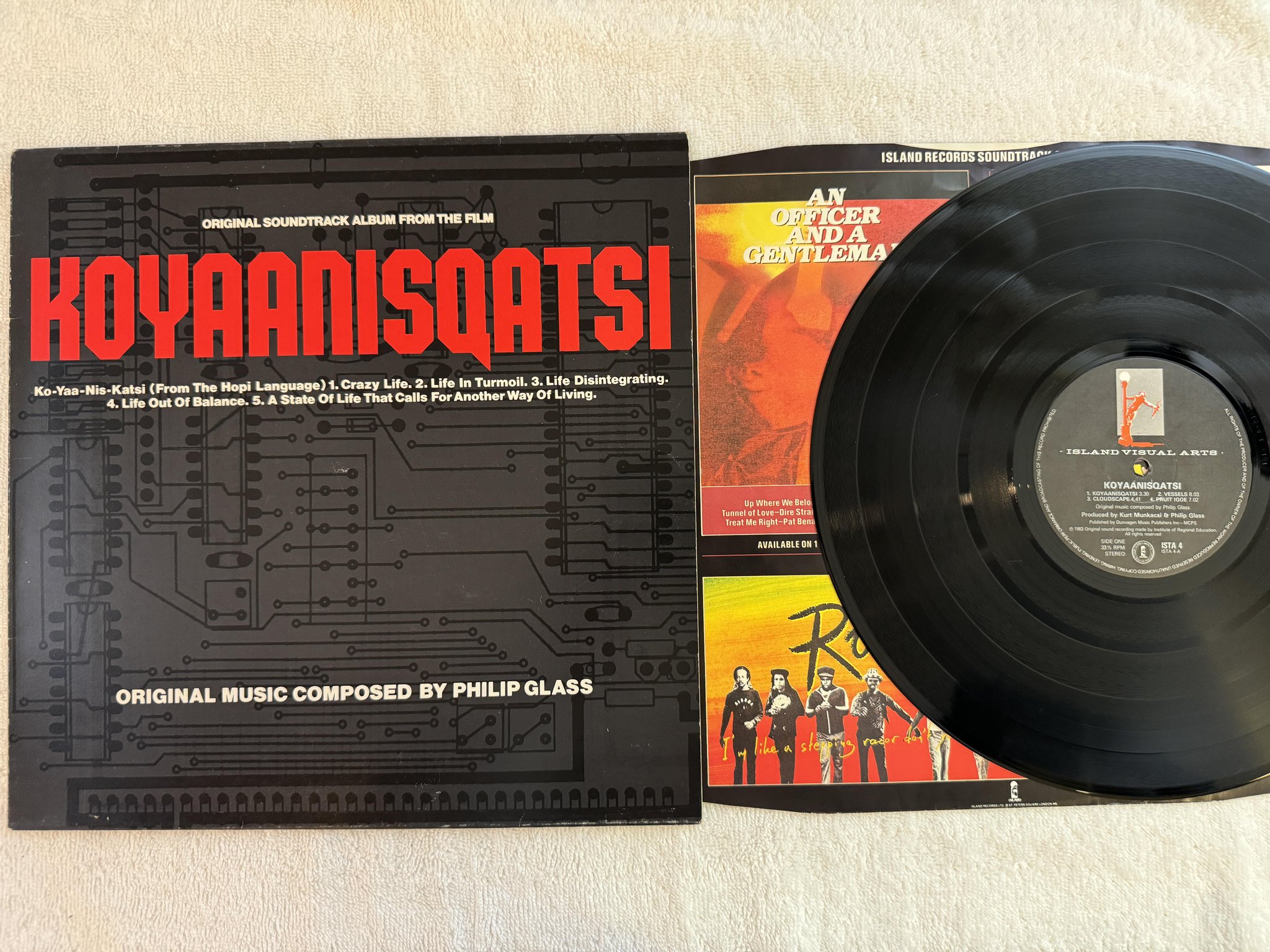 Omslagsbild för skivan PHILIP GLASS koyaanisqatsi LP -83 UK ISLAND ISTA 4