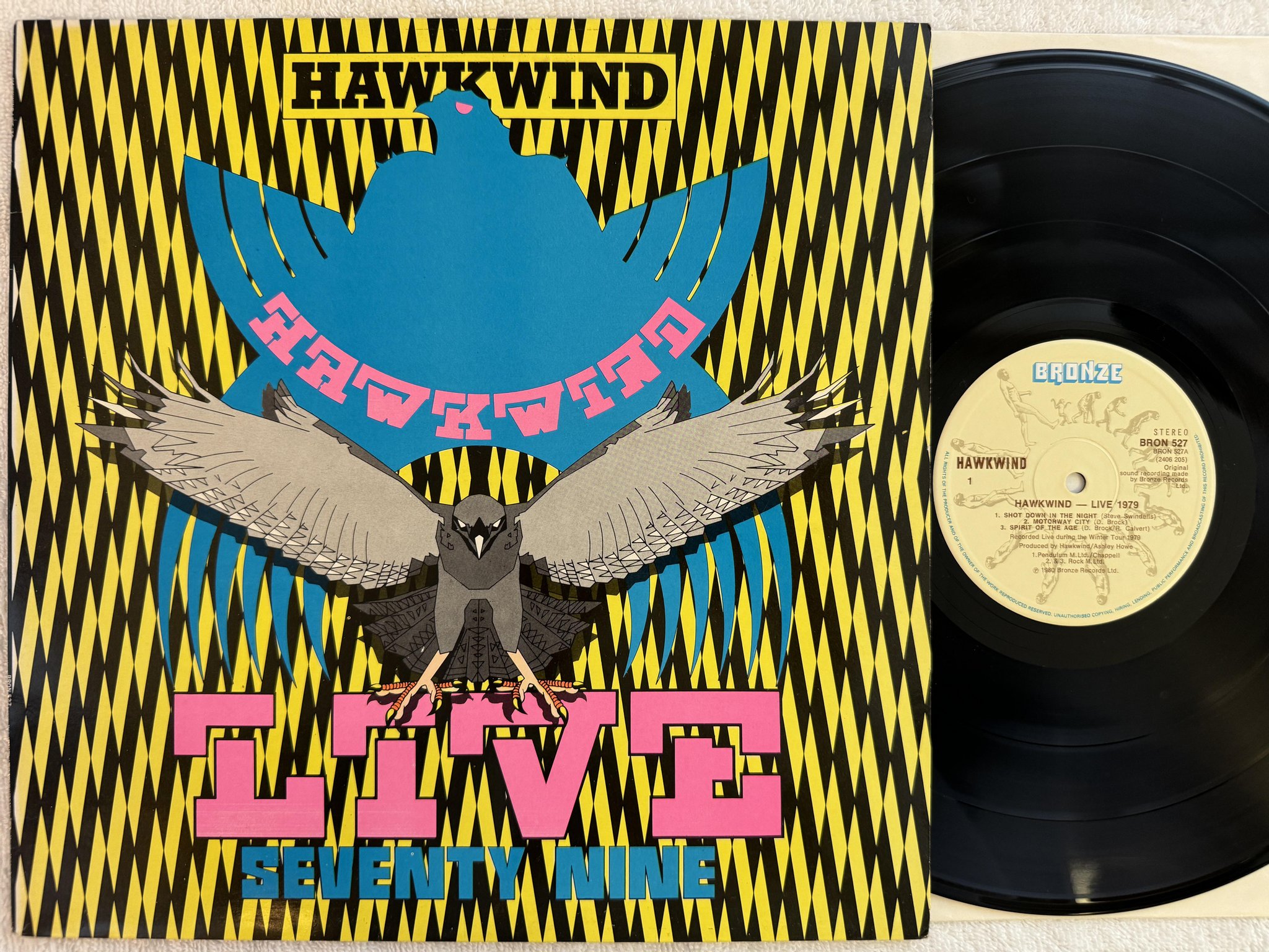 Omslagsbild för skivan HAWKWIND live 1979 LP -80 UK BRONZE BRON 527