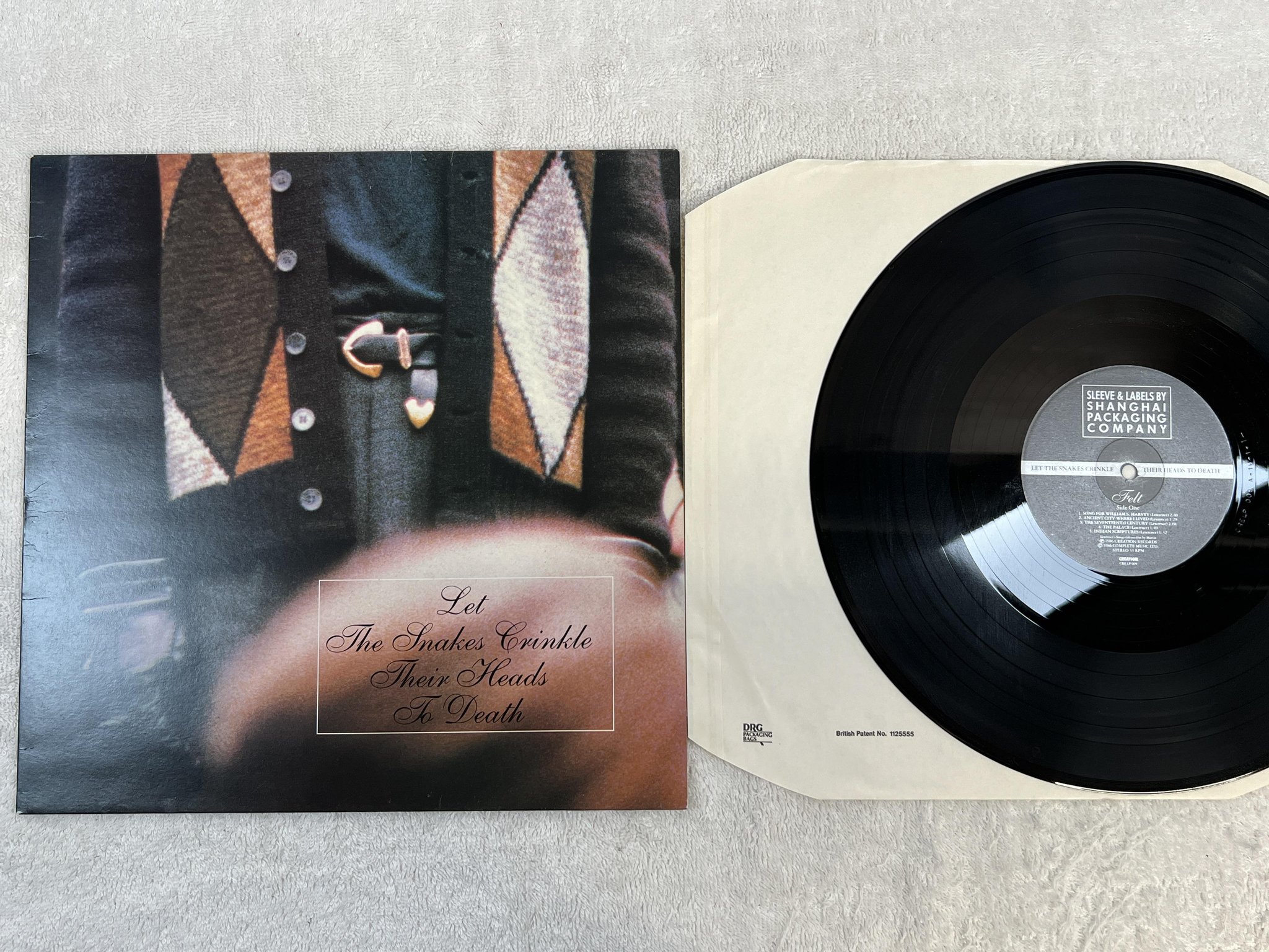 Omslagsbild för skivan FELT Let The Snakes Crinkle Their Heads To Death LP -86 UK CREATION CRE LP 009
