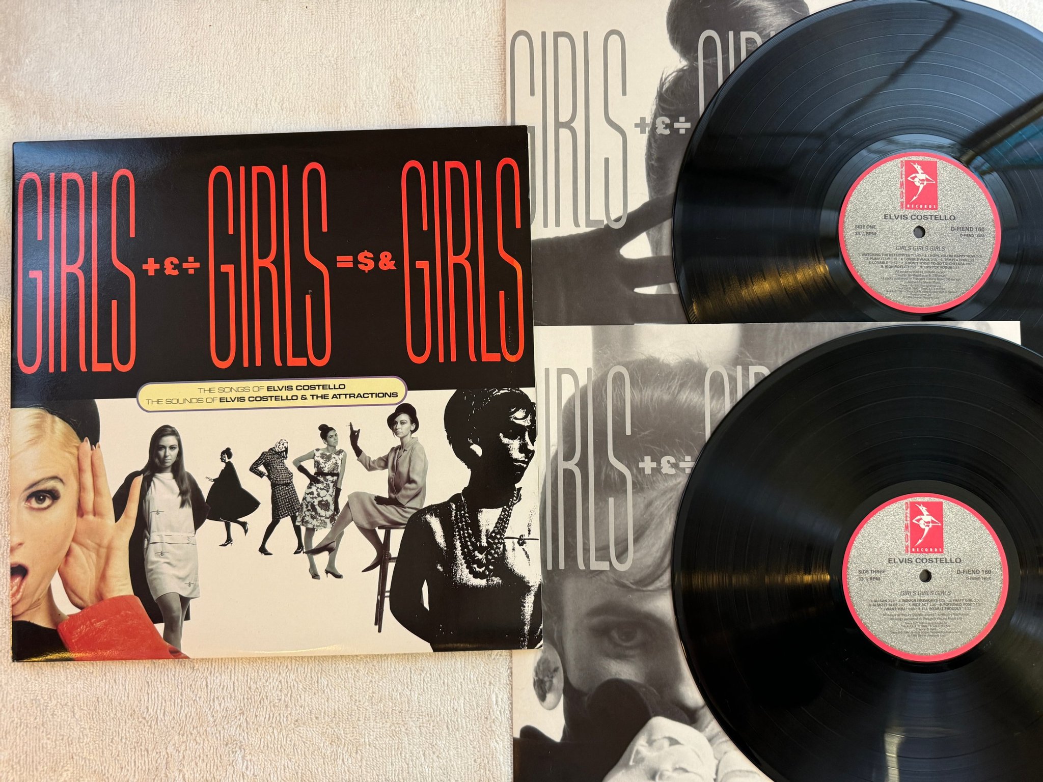 Omslagsbild för skivan ELVIS COSTELLO Girls +£÷ Girls =$& Girls 2xLP -89 DEMON D-FIEND 160