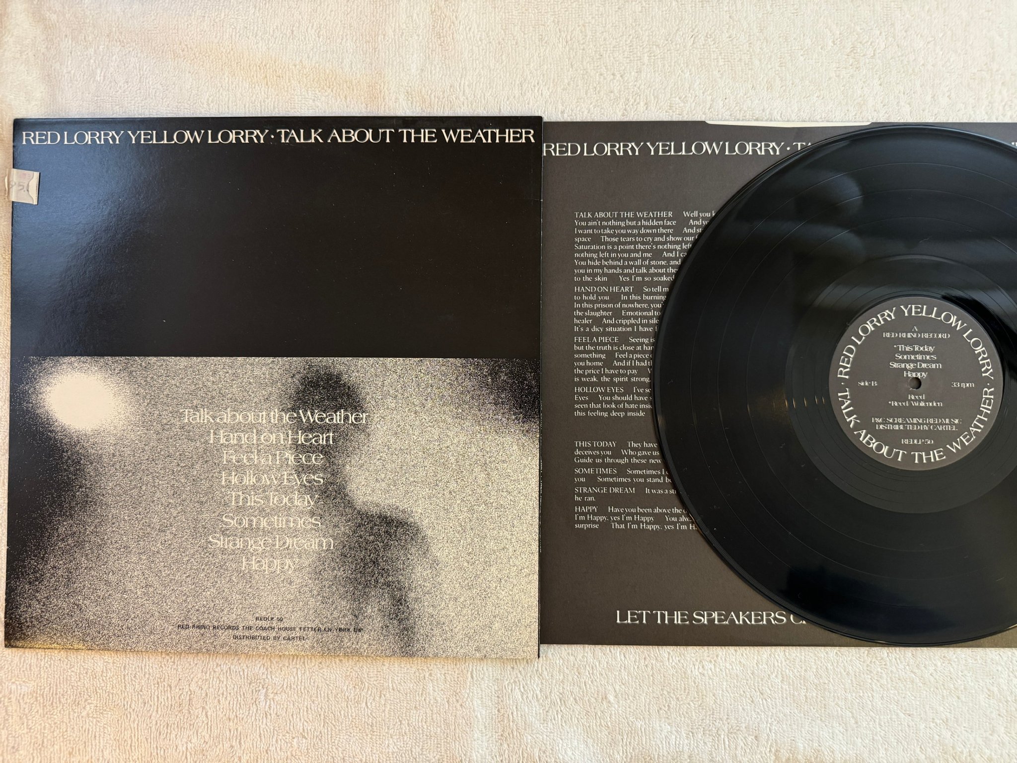 Omslagsbild för skivan RED LORRY YELLOW LORRY Talk About The Weather LP -85 UK RED RHINO REDLP 50