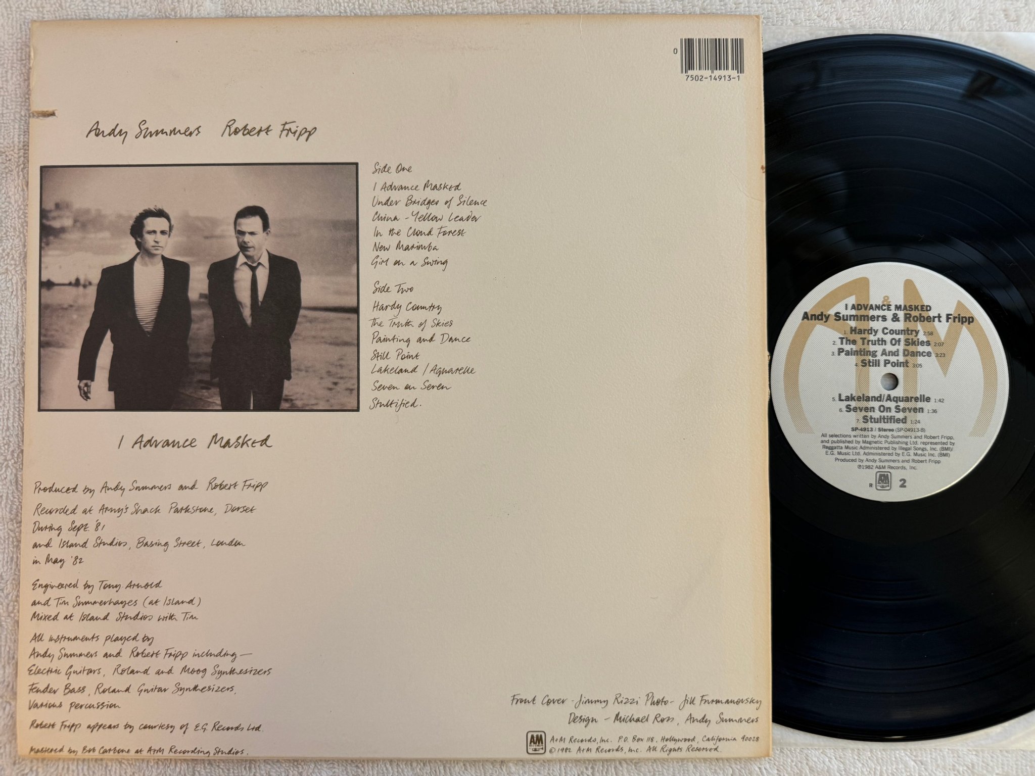 Omslagsbild för skivan ANDY SUMMERS ROBERT FRIPP advance masked LP -82 US A&M SP 4913