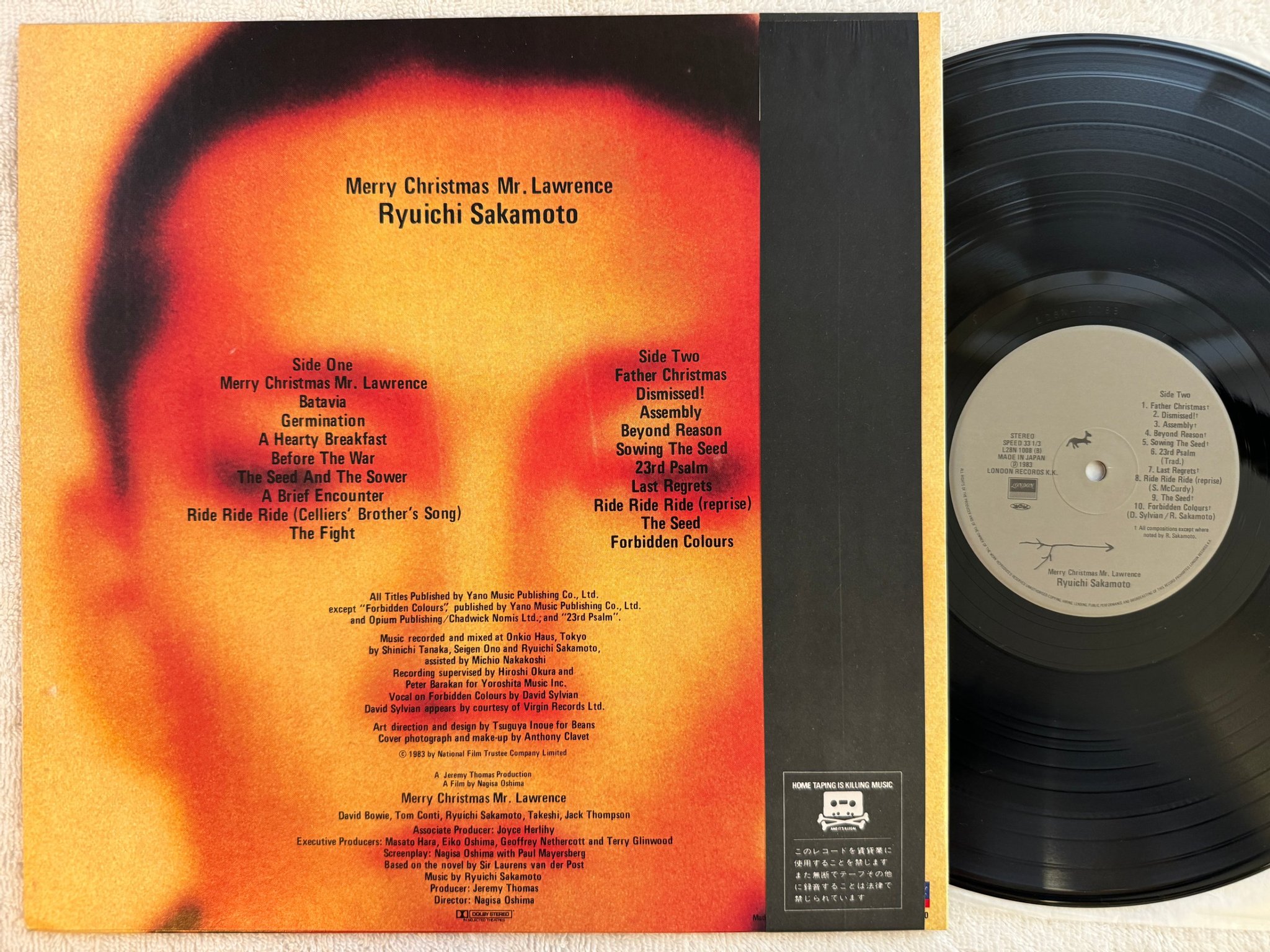Omslagsbild för skivan RYUICHI SAKAMOTO Merry Christmas Mr. Lawrence LP -83 Japan LONDON L28N 1008