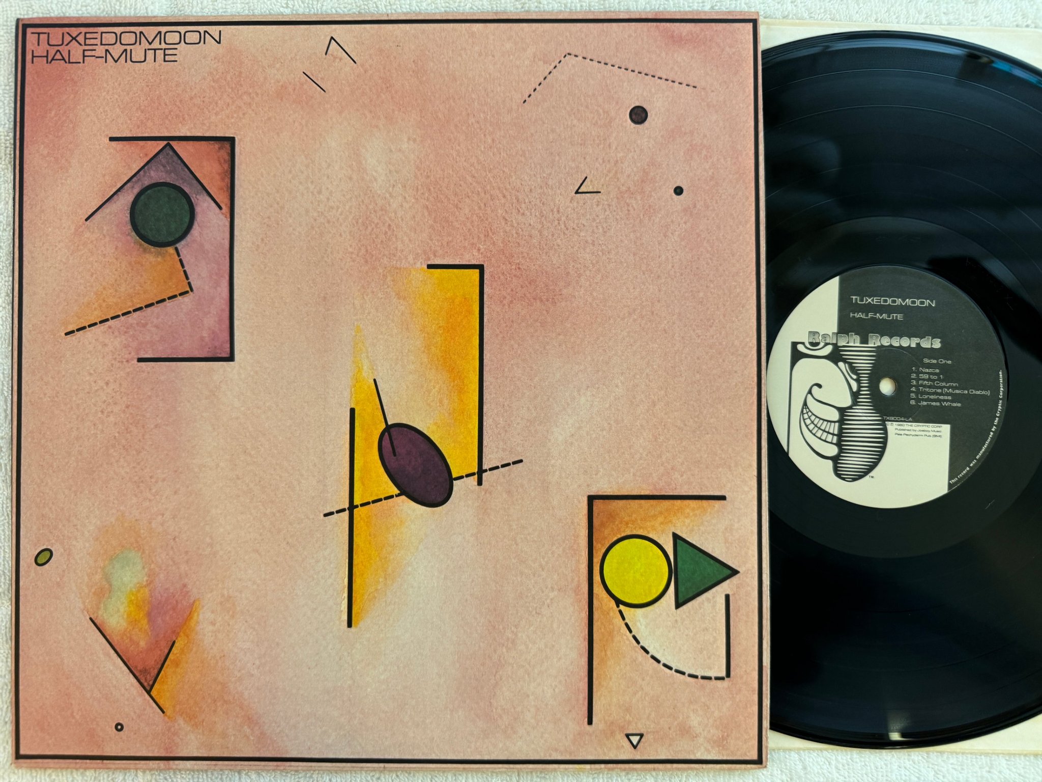 Omslagsbild för skivan TUXEDOMOON half-mute LP -80 US RALPH RECORDS TX 8004-LA