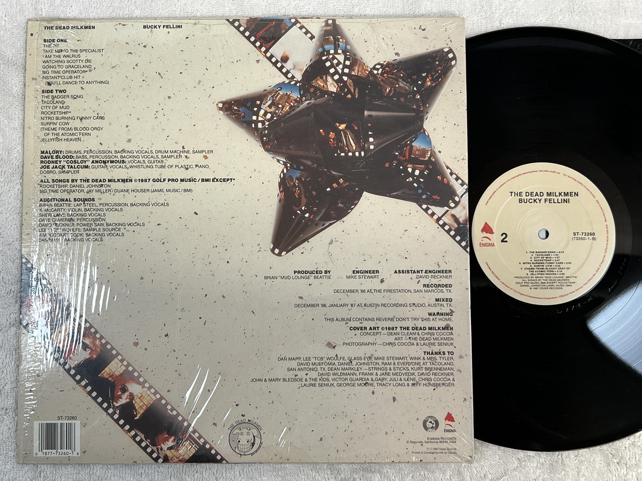 Omslagsbild för skivan THE DEAD MILKMEN Bucky Fellini LP -87 Can ENIGMA ST-73260