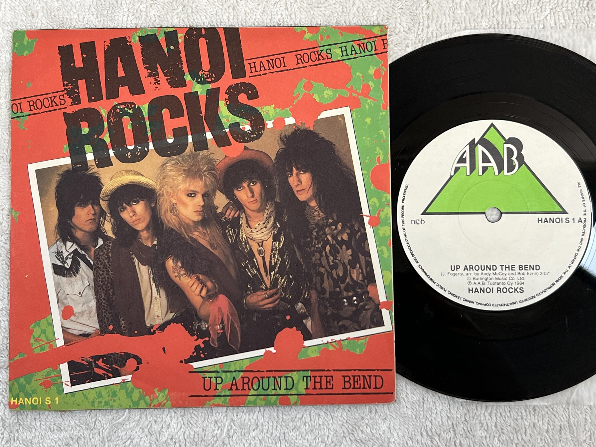 Omslagsbild för skivan HANOI ROCKS up around the bend 7" -84 Finland AAB HANOI S 1