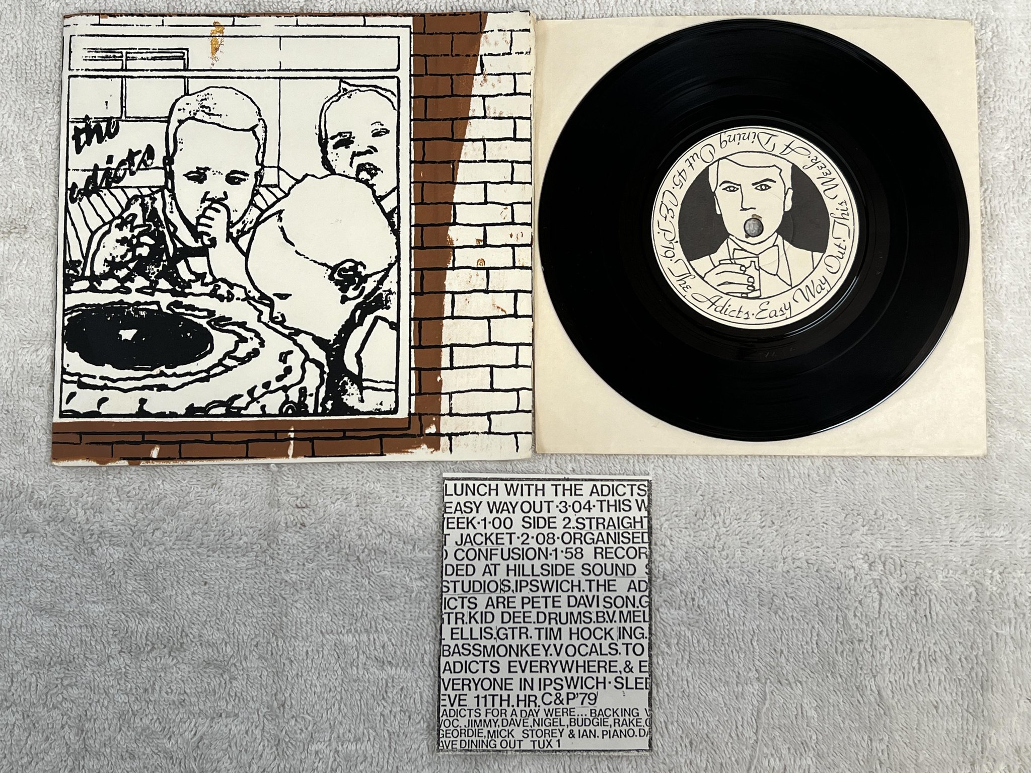 Omslagsbild för skivan THE ADICTS Lunch With The Adicts 7" -79 UK DINING OUT TUX 1 *** PUNK ***