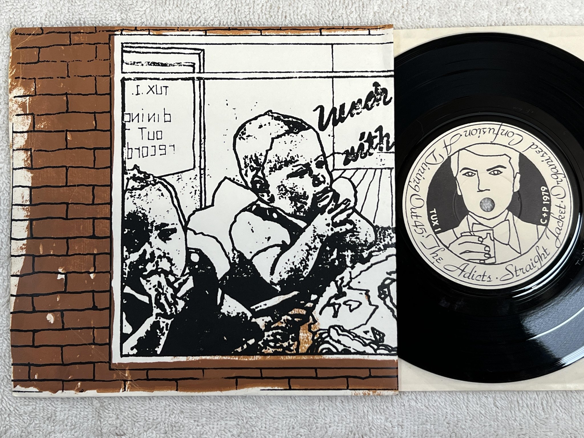 Omslagsbild för skivan THE ADICTS Lunch With The Adicts 7" -79 UK DINING OUT TUX 1 *** PUNK ***