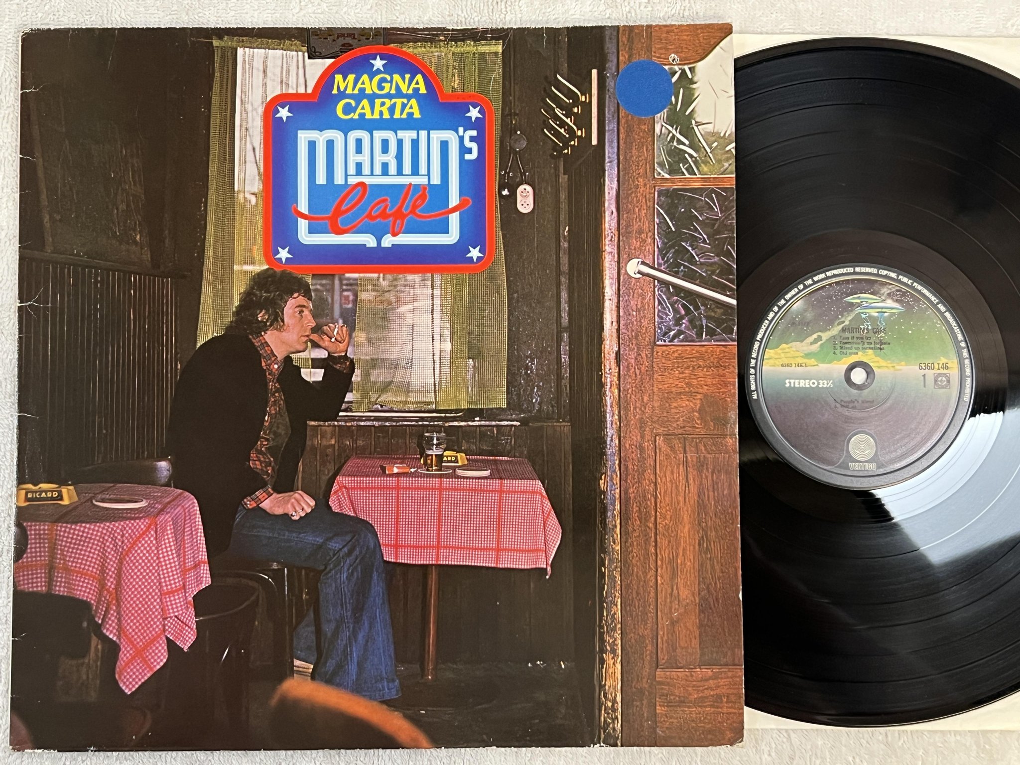 Omslagsbild för skivan MAGNA CARTA Martin's Cafe LP -77 Hol VERTIGO 6360 146