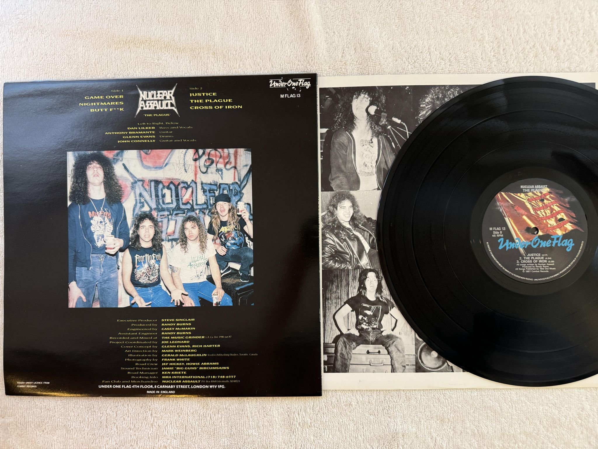 Omslagsbild för skivan NUCLEAR ASSAULT The Plague 12"EP -87 UK UNDER ONE FLAG M FLAG 13