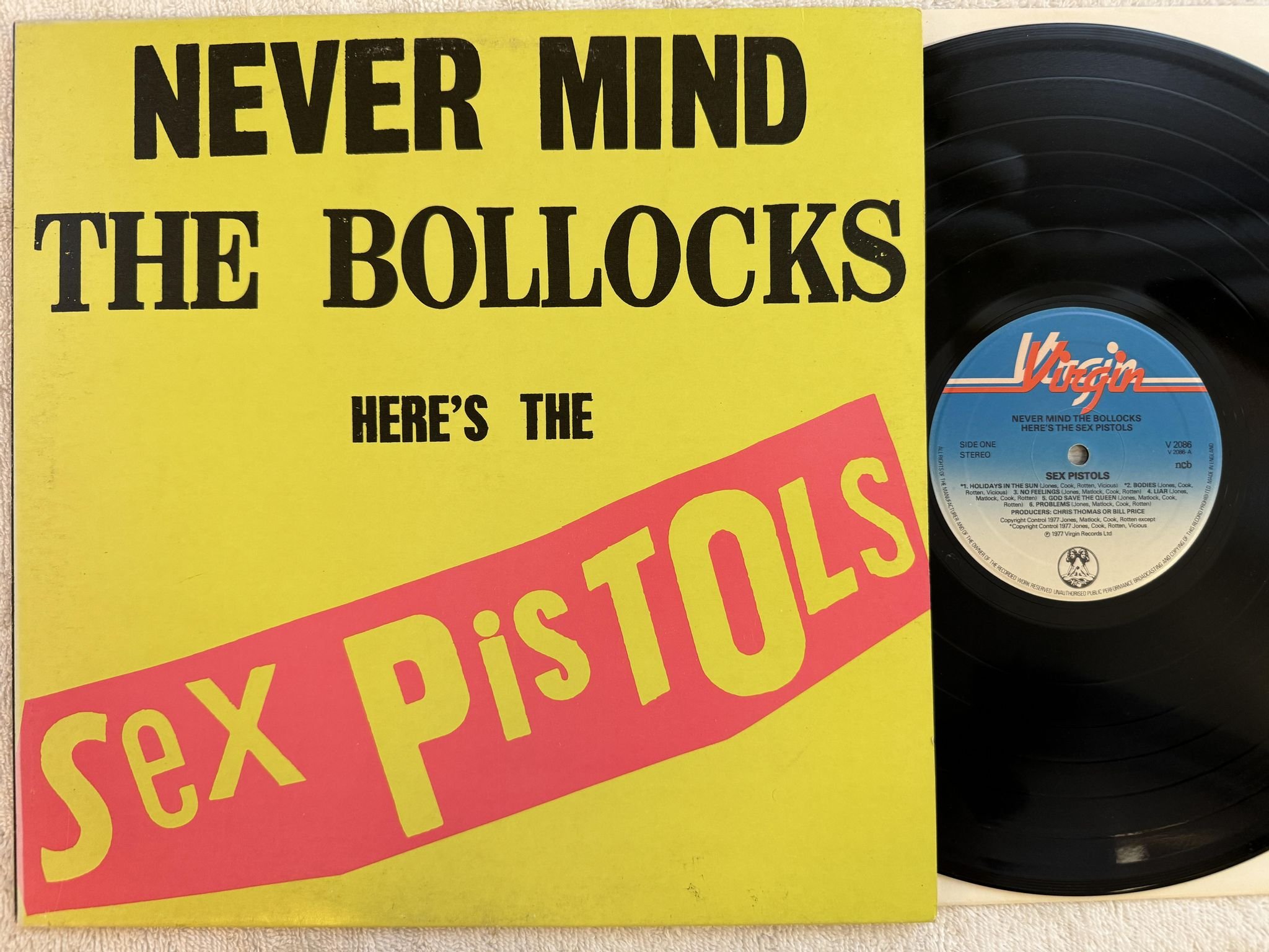 Omslagsbild för skivan SEX PISTOLS never mind the bollocks LP -77 ncb VIRGIN V 2086
