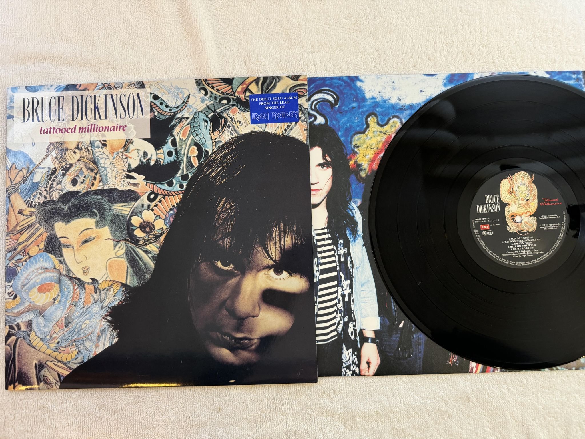 Omslagsbild för skivan BRUCE DICKINSON Tattooed Millionaire LP -90 EMI 064-7942731