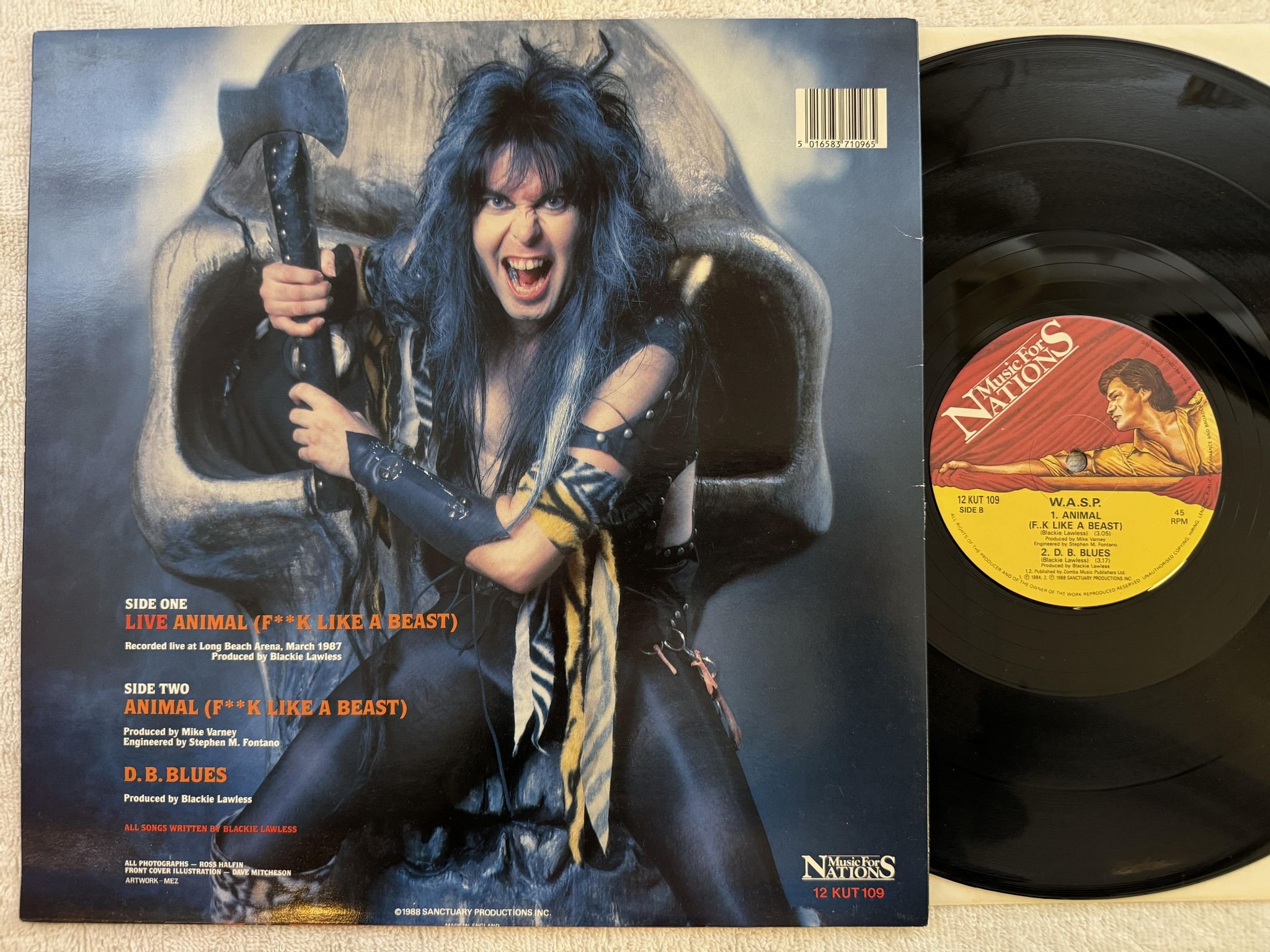 Omslagsbild för skivan W.A.S.P. live animal 12"single -88 UK MUSIC FOR NATIONS 12 KUT 109