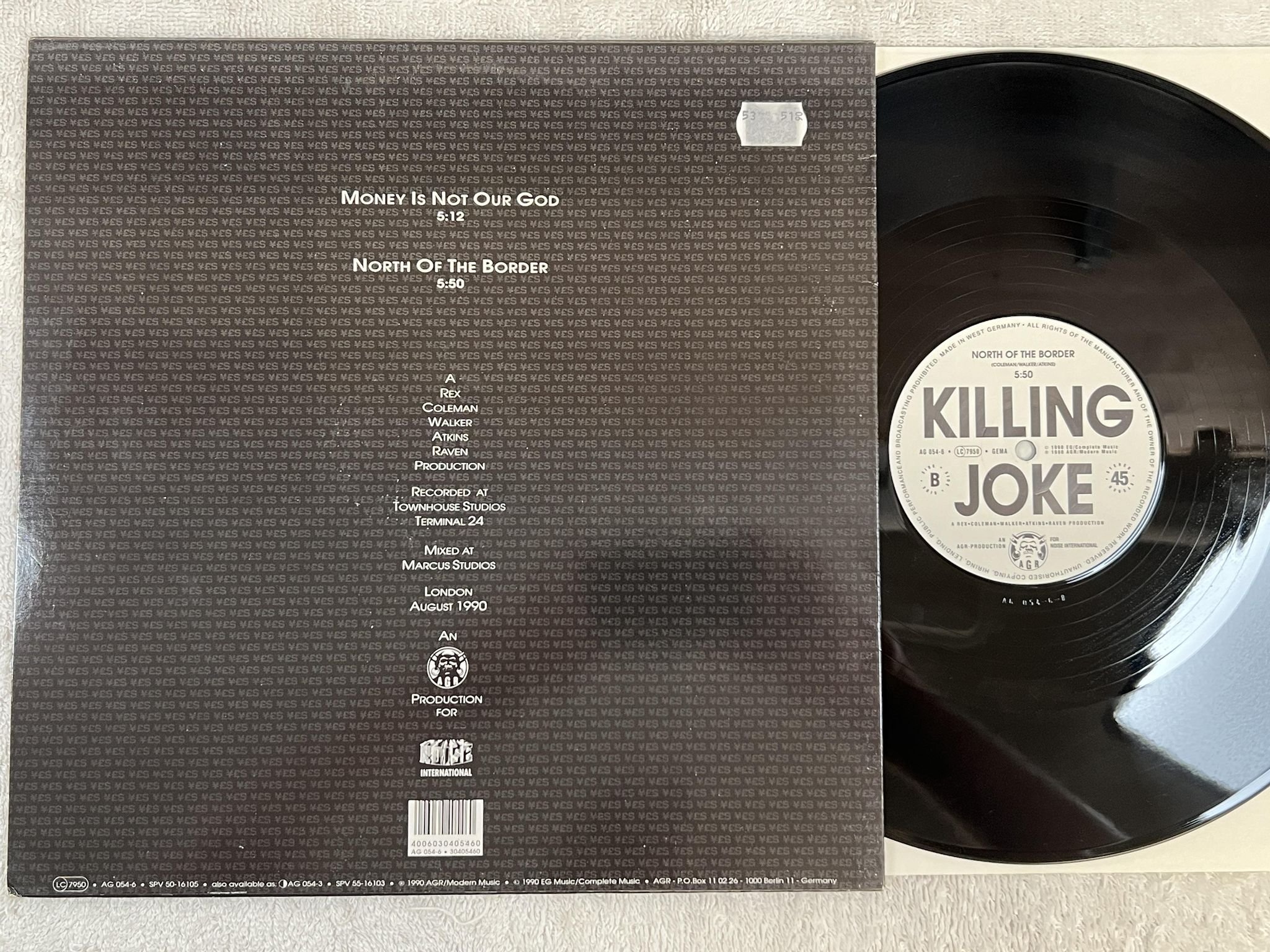 Omslagsbild för skivan KILLING JOKE money is not your god 12" -90 Ger AGR AG 054-6