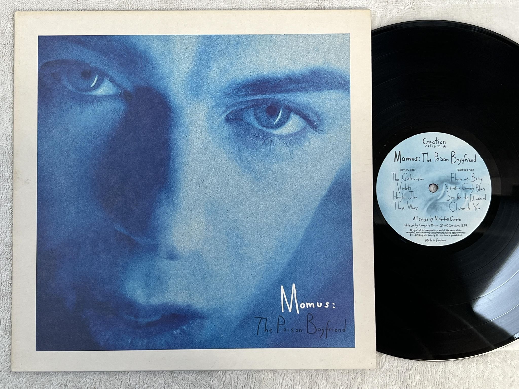 Omslagsbild för skivan MOMUS The Poison Boyfriend LP -87 UK CREATION CRELP 021