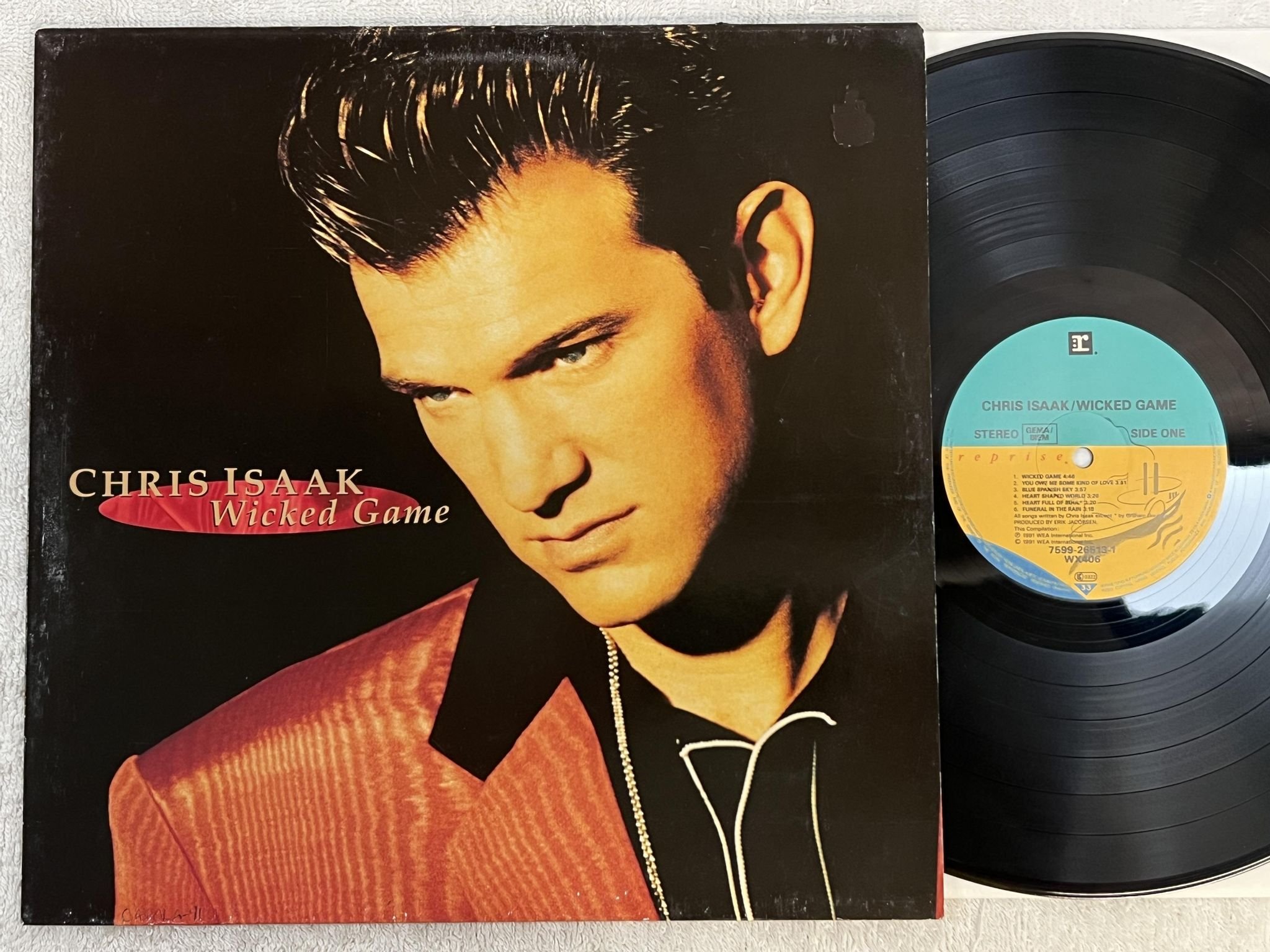 Omslagsbild för skivan CHRIS ISAAK wicked game LP -91 REPRISE 7599-26513-1 *** CLASSIC ***
