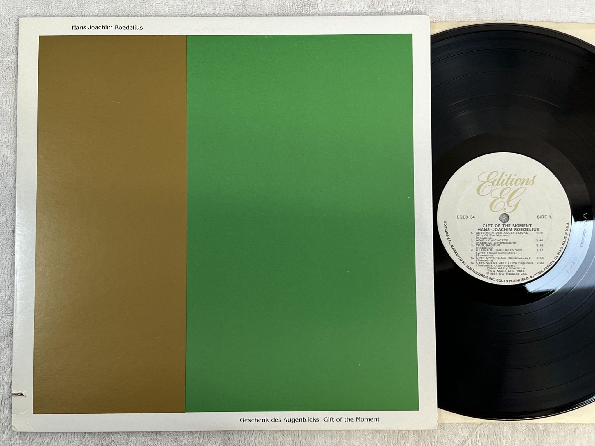 Omslagsbild för skivan HANS-JOACHIM ROEDELIUS Gift Of The Moment LP -84 US EDITIONS EG EGED 34