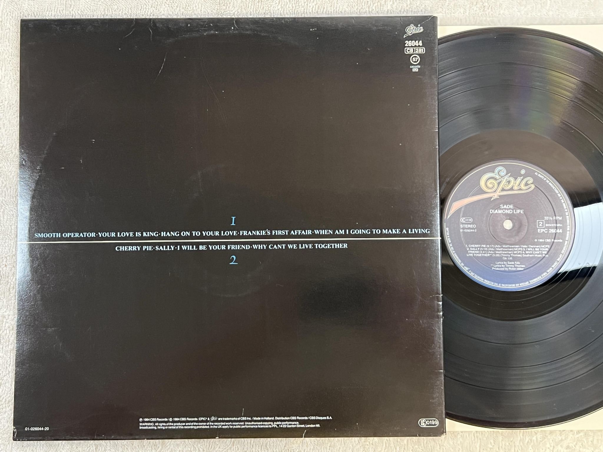 Omslagsbild för skivan SADE diamond life LP -84 Hol EPIC EPC 26044