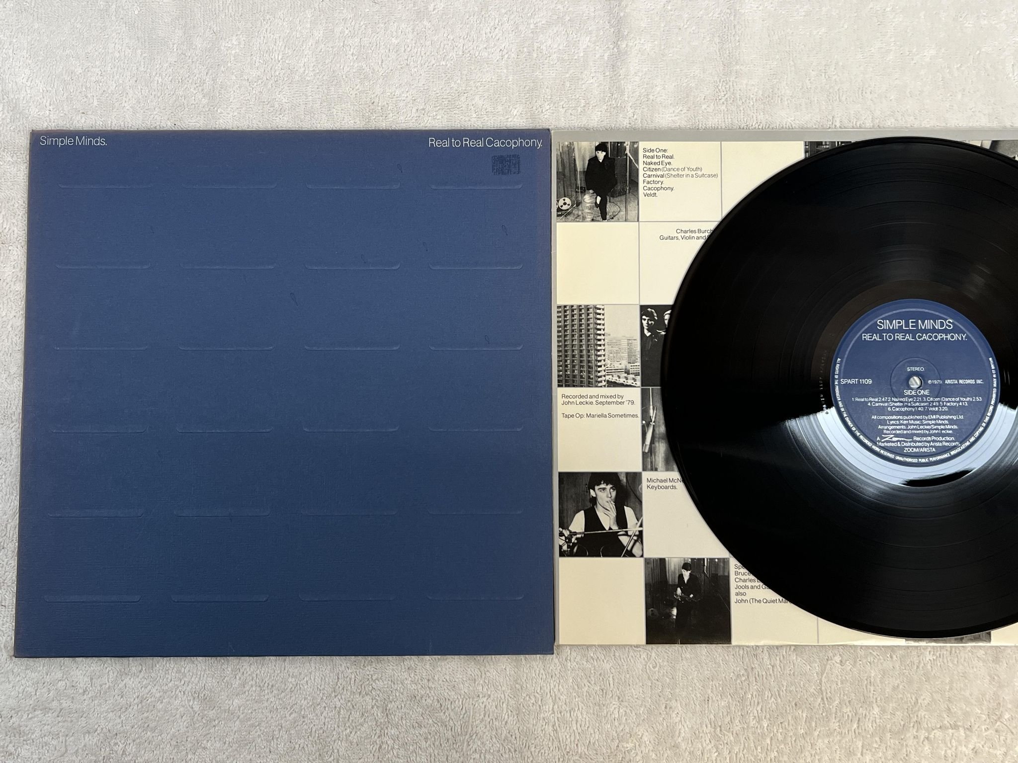 Omslagsbild för skivan SIMPLE MINDS real to real cacophony LP -79 UK ARISTA SPART-1109