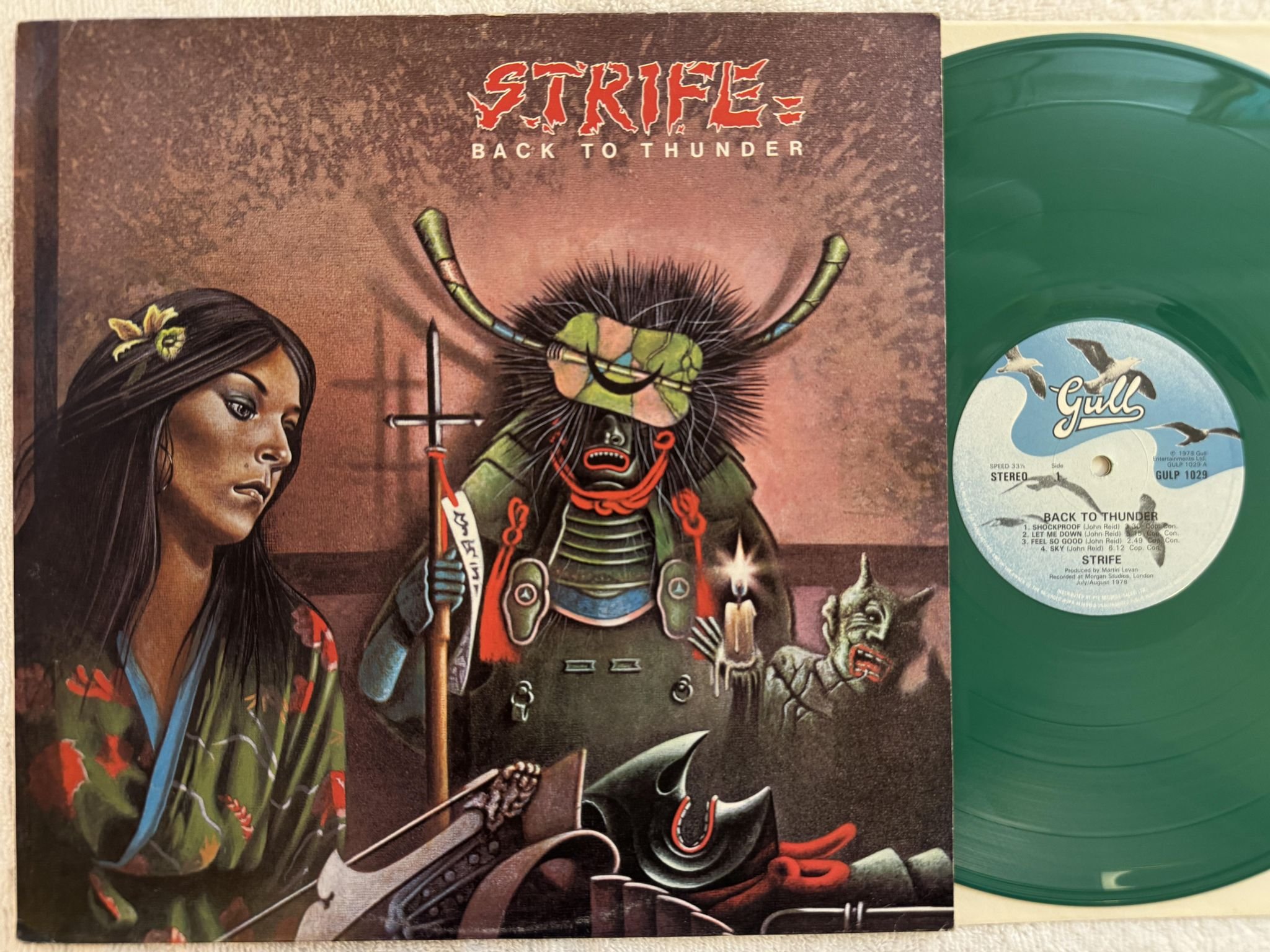 Omslagsbild för skivan STRIFE back to thunder LP -78 UK GULL GULP 1029 *** GREEN VINYL ***