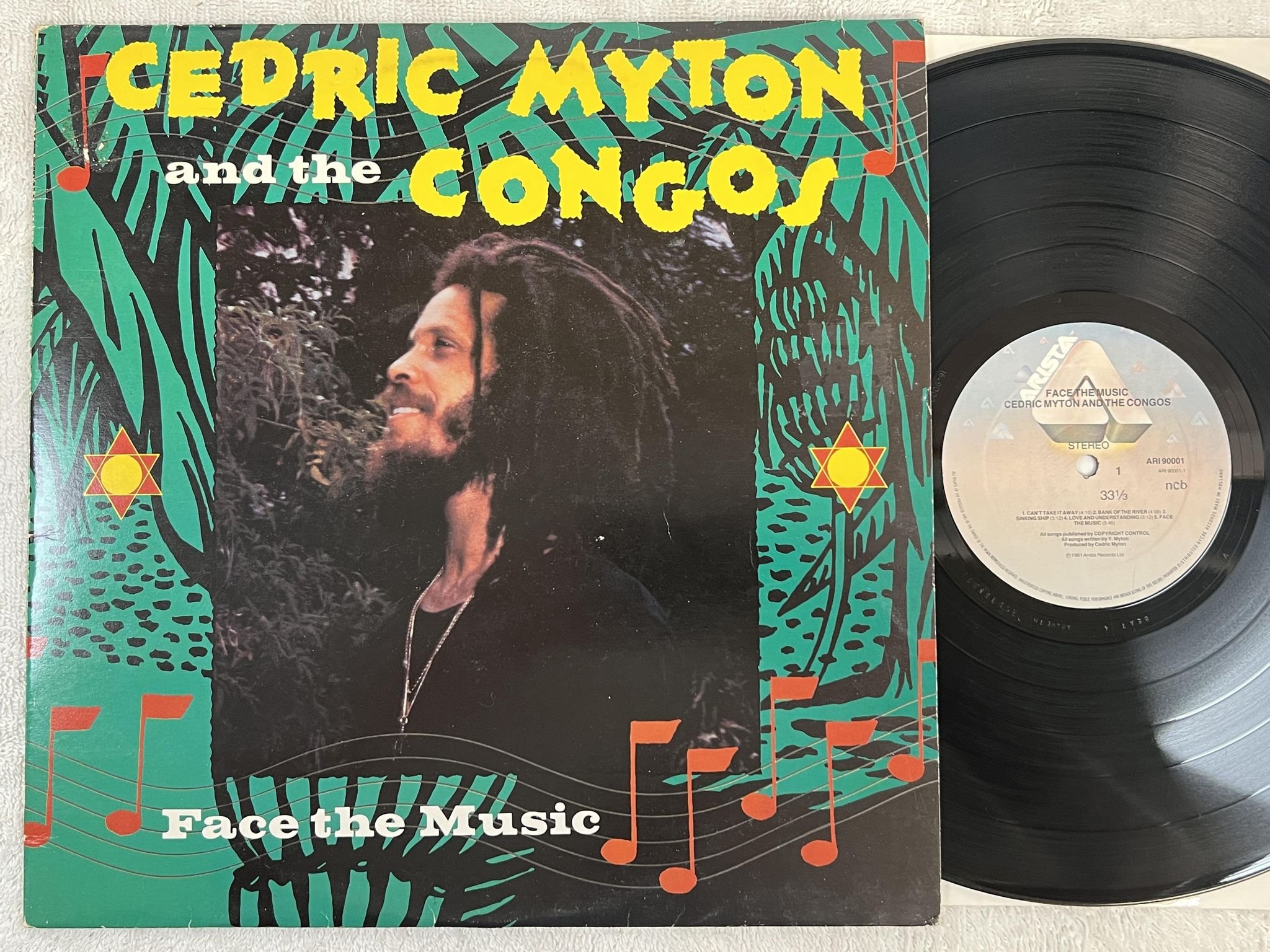 Omslagsbild för skivan CEDRIC MYTON AND THE CONGOS face the music LP -81 ncb ARISTA ARI 90001