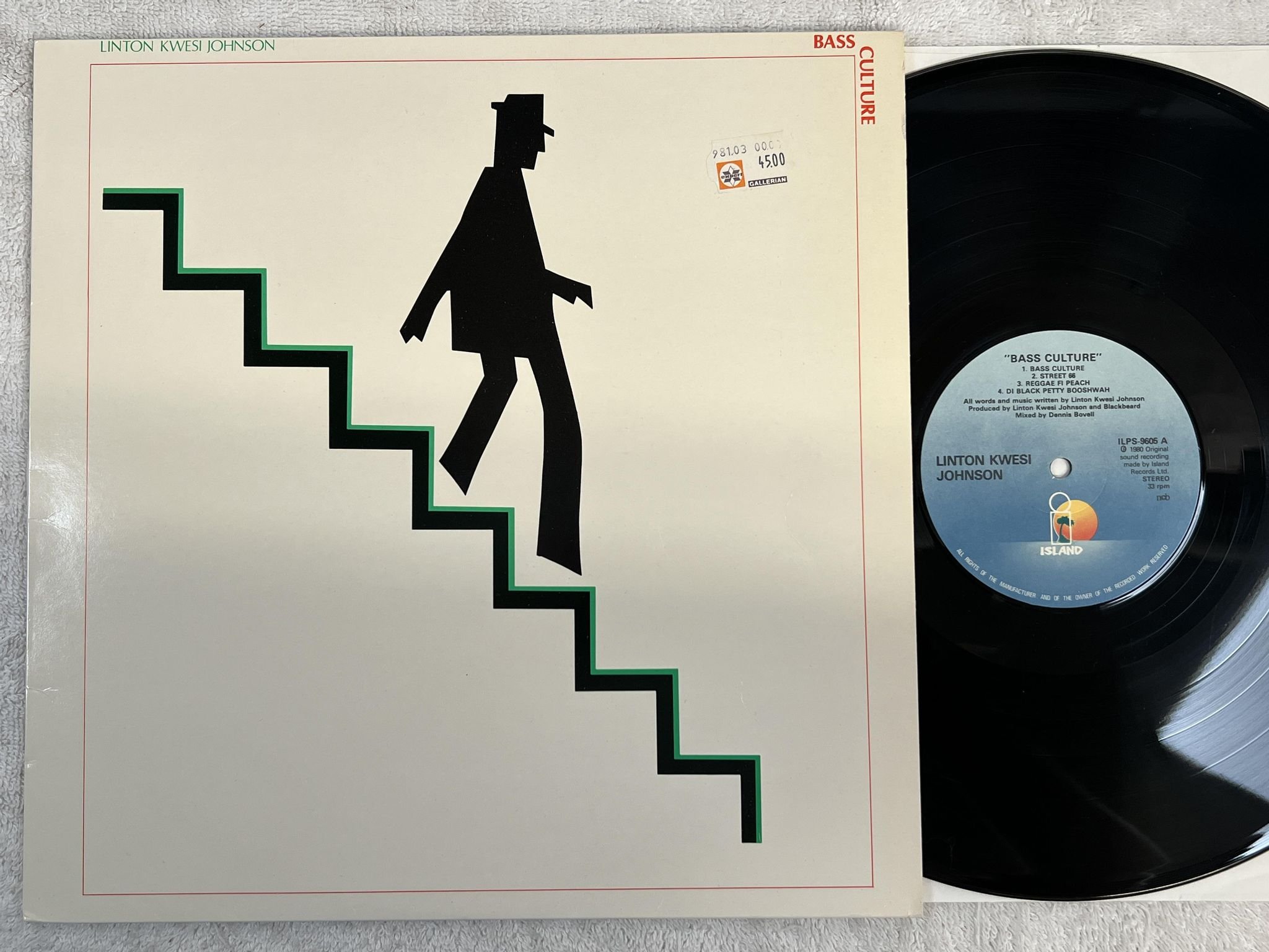 Omslagsbild för skivan LINTON KWESI JOHNSON bass culture LP -80 ncb ISLAND ILPS 9605