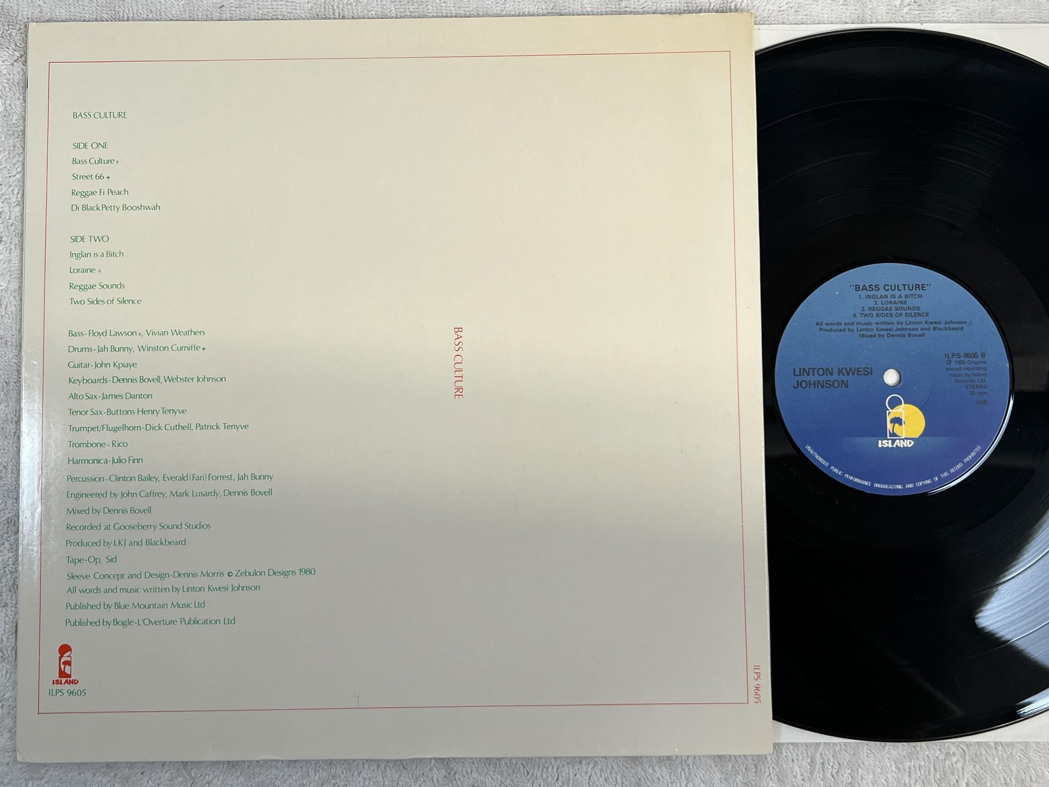 Omslagsbild för skivan LINTON KWESI JOHNSON bass culture LP -80 ncb ISLAND ILPS 9605