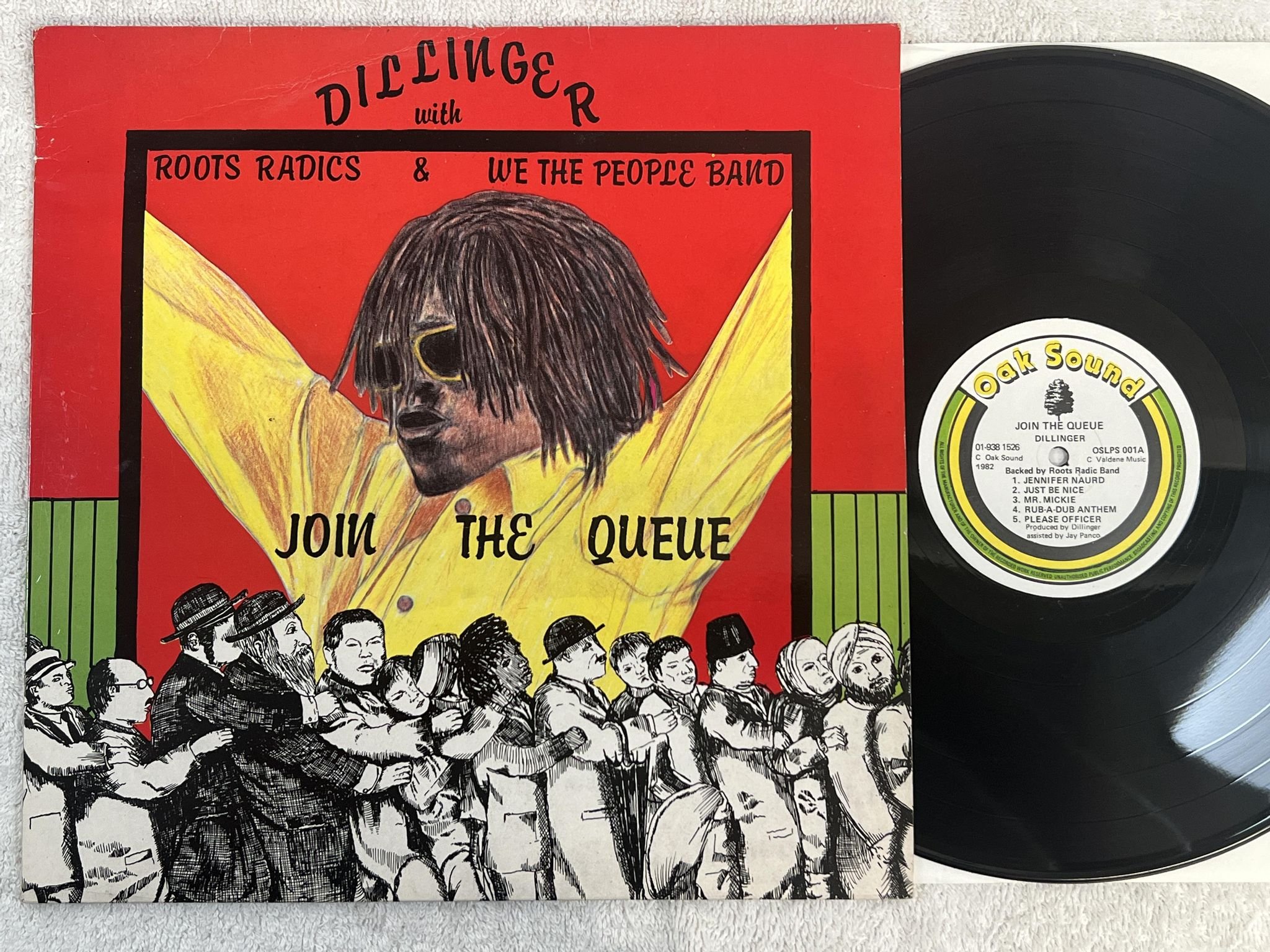 Omslagsbild för skivan DILLINGER w/ ROOTS RADICS join the queue LP -82 UK OAK SOUND OSLPS 001