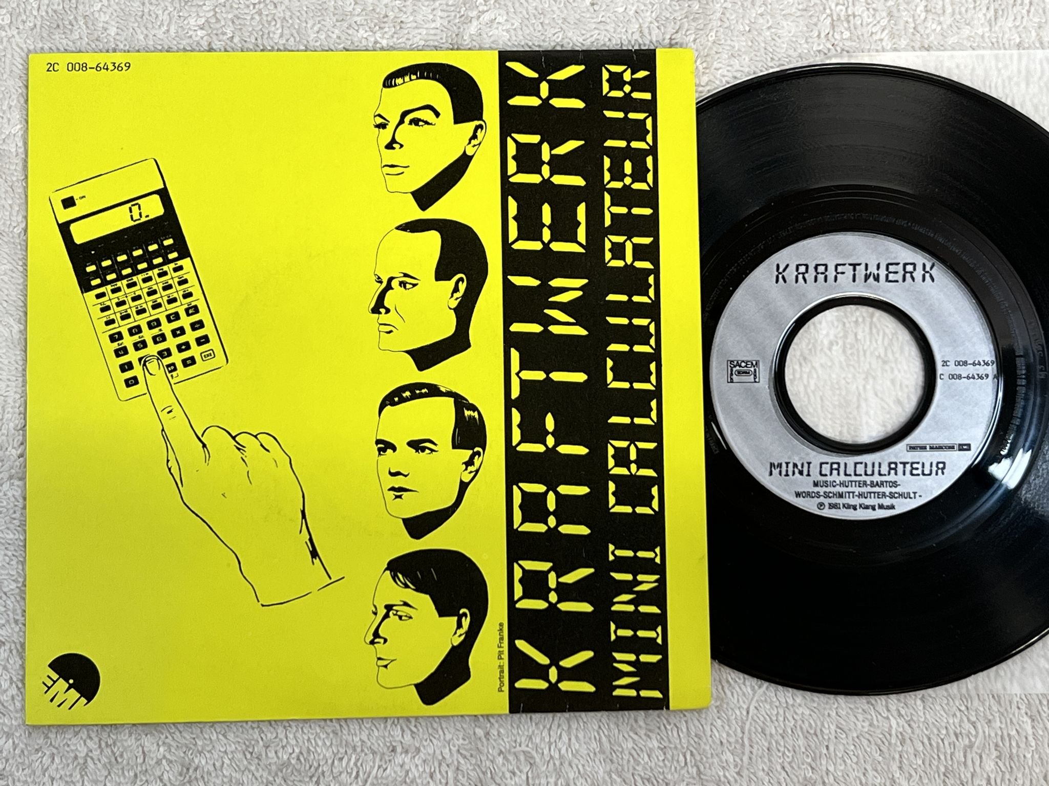 Omslagsbild för skivan KRAFTWERK Mini Calculateur 7" -81 Fra EMI 2C 008 64369 *** SYNTH ***