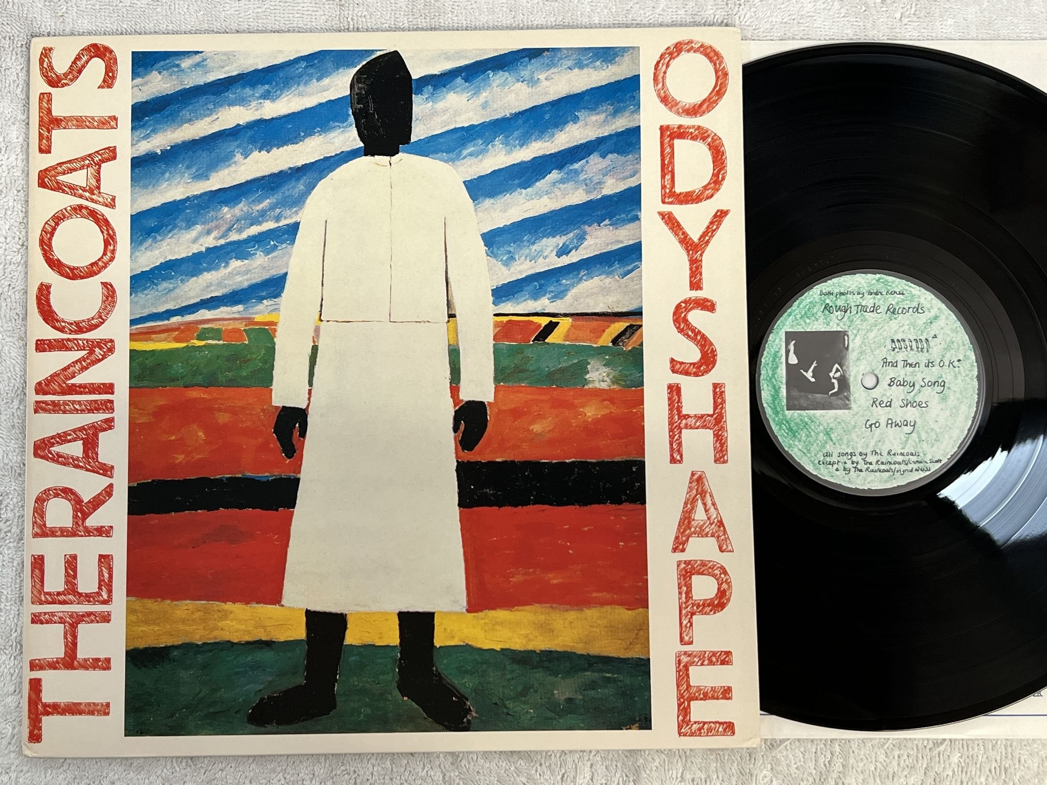 Omslagsbild för skivan THE RAINCOATS Odyshape LP -81 UK ROUGH TRADE ROUGH 13