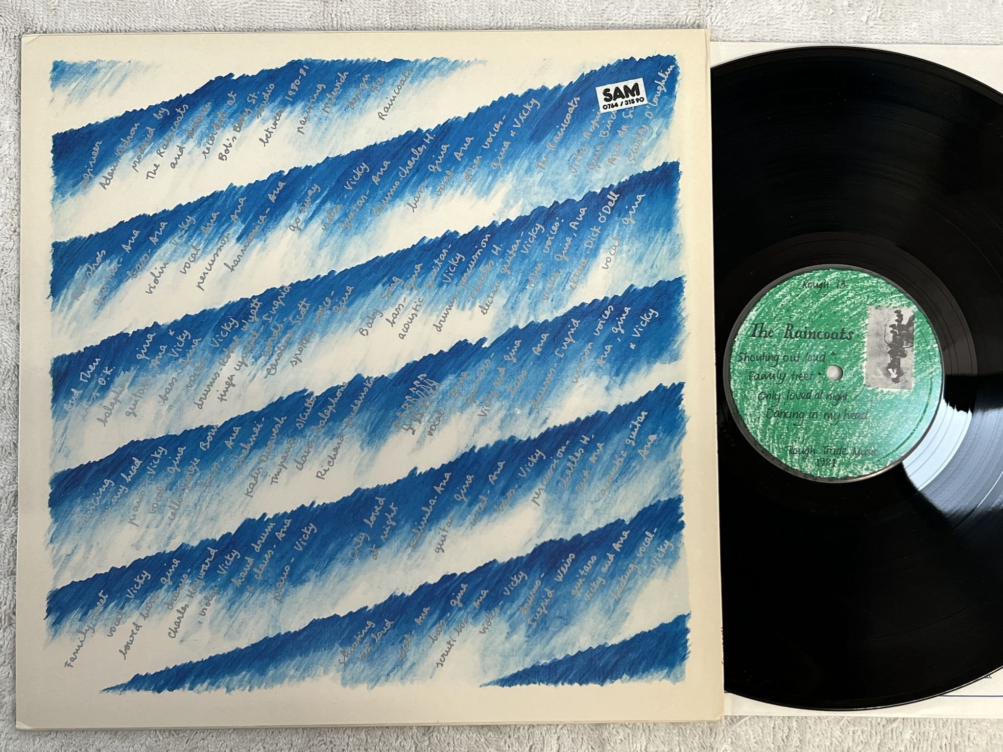 Omslagsbild för skivan THE RAINCOATS Odyshape LP -81 UK ROUGH TRADE ROUGH 13