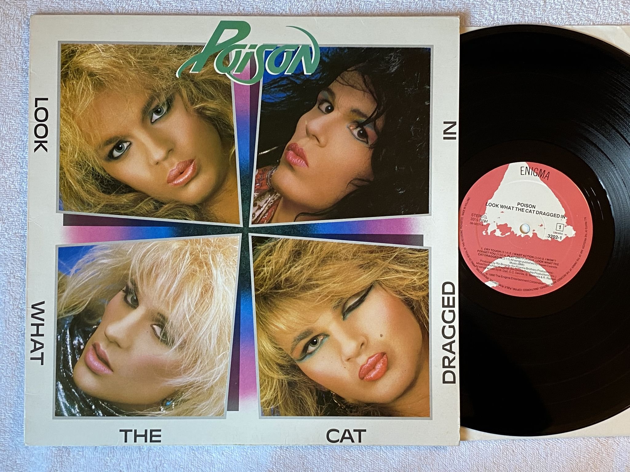 Omslagsbild för skivan POISON Look What The Cat Dragged In LP -86 ENIGMA 3202-1